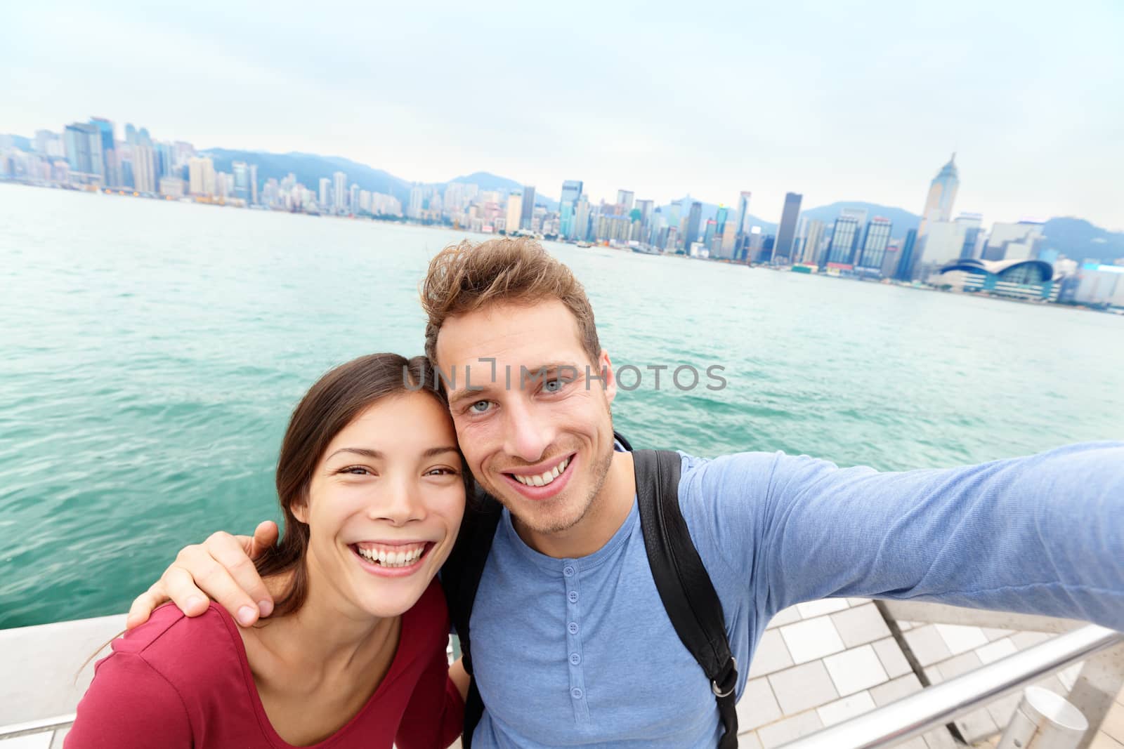 Selfie - Tourists couple taking picture Hong Kong by Maridav