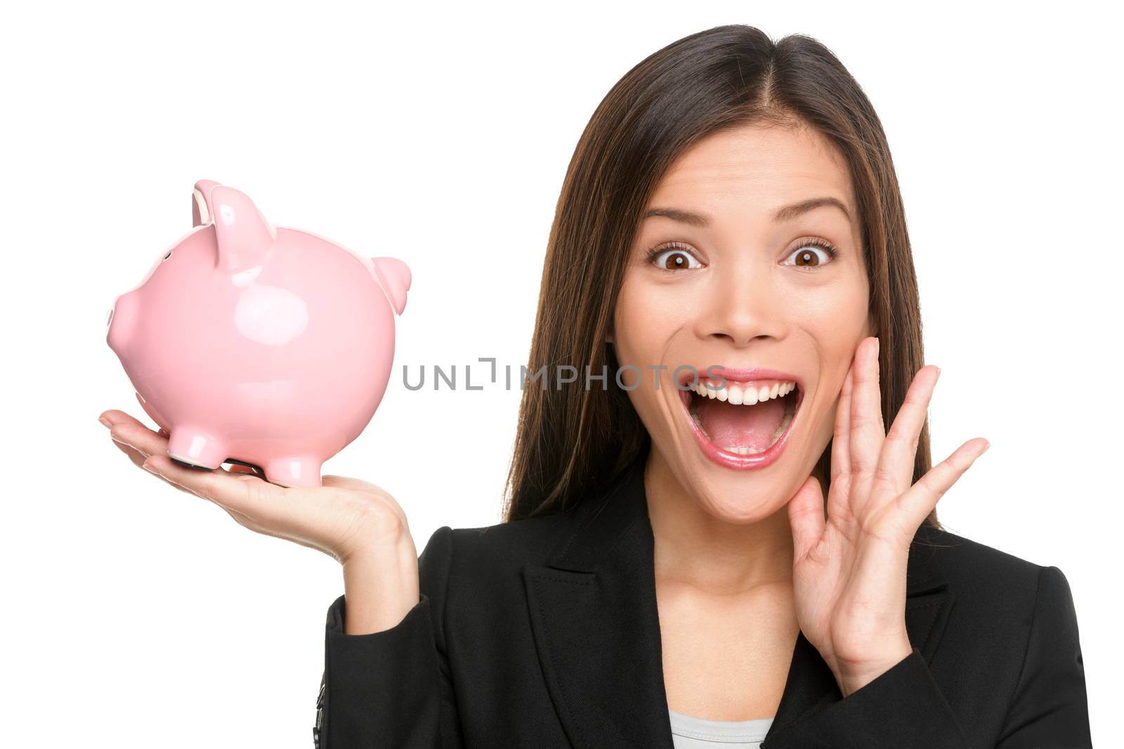 Woman holding piggy bank screaming and shouting excited and funny. Savings and banking with happy businesswoman holding pink piggy bank. Investment and savings concept.