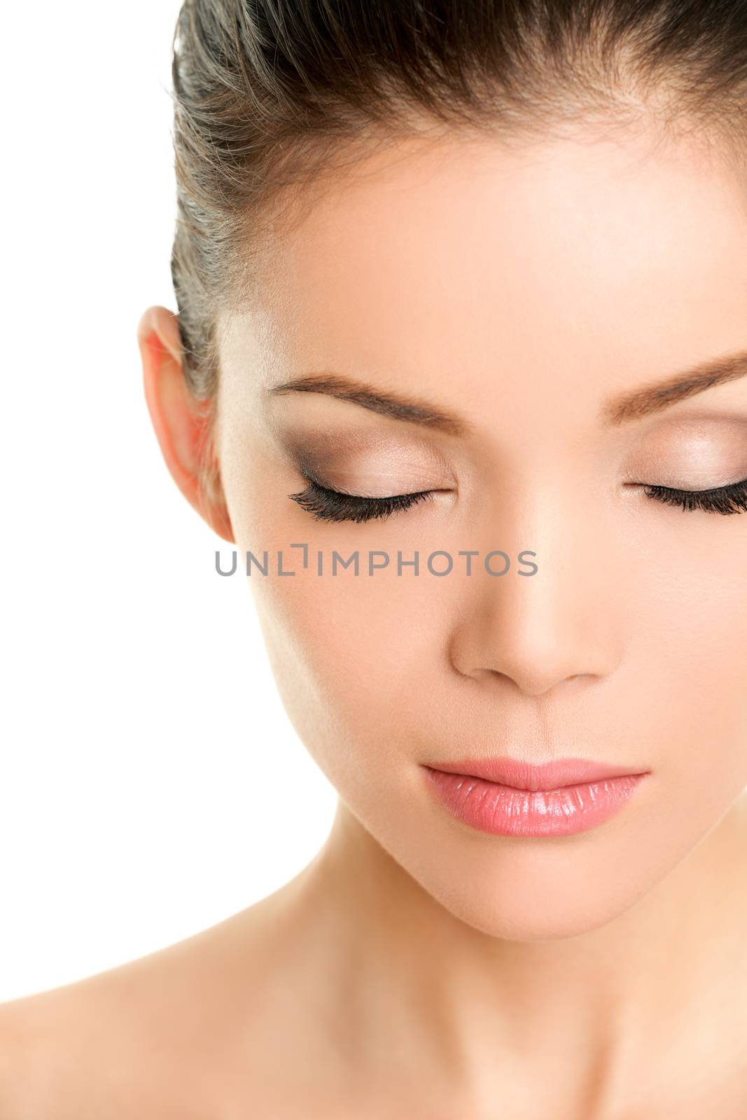 Closed eyes beauty face - Asian chinese woman showing fake eyelashes or eye makeup