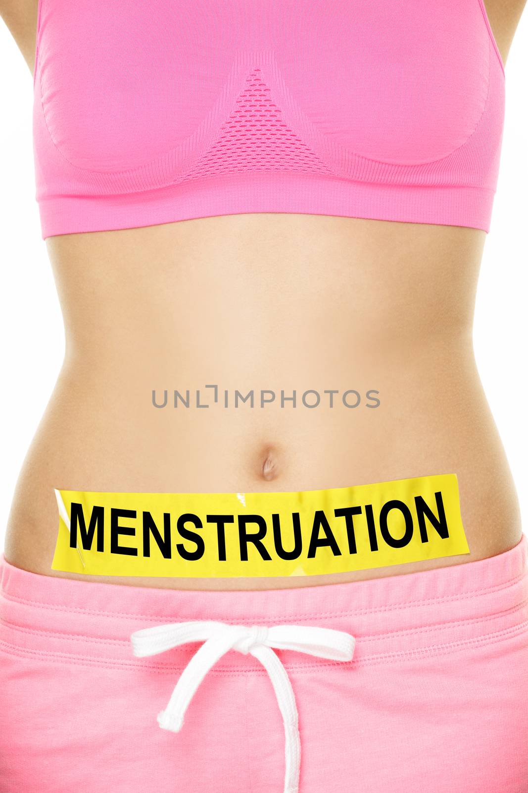 Menstruation. Conceptual Bare Woman Belly with Menstruation Text on Yellow Tape, Isolated on White Background.