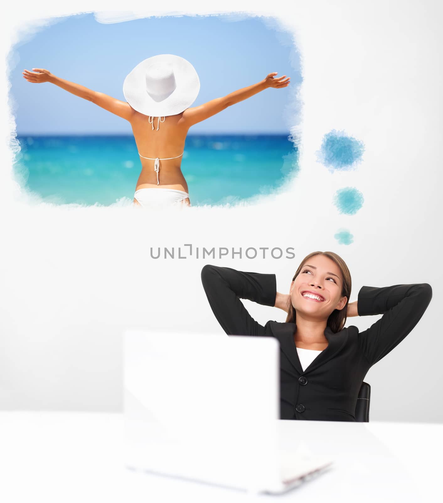 Smiling businesswoman sitting at her desk dreaming of a tropical beach and her summer vacation holidays travel in a sunhat and bikini