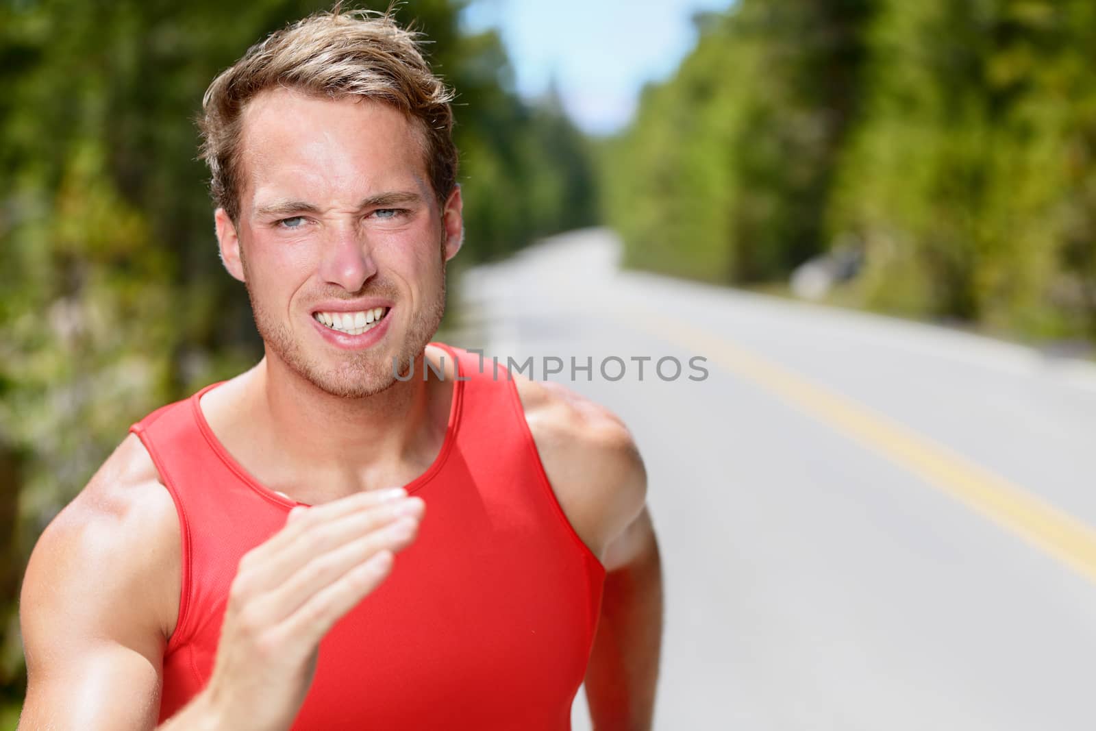 Man runner running endurance training jogging by Maridav