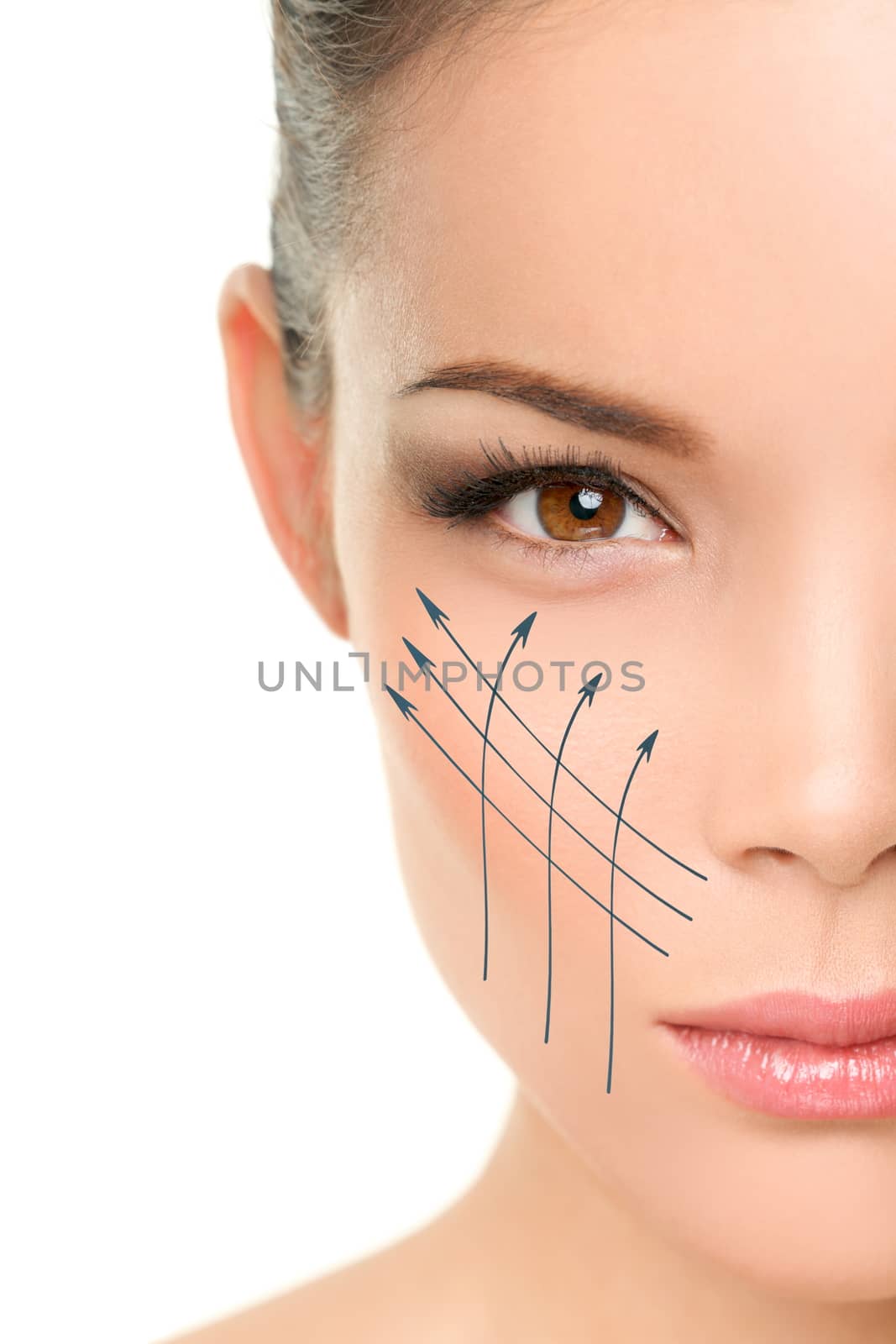 Face lift anti-aging treatment - Asian woman portrait with graphic lines showing facial lifting effect on perfect skin. Skincare cosmetic concept.