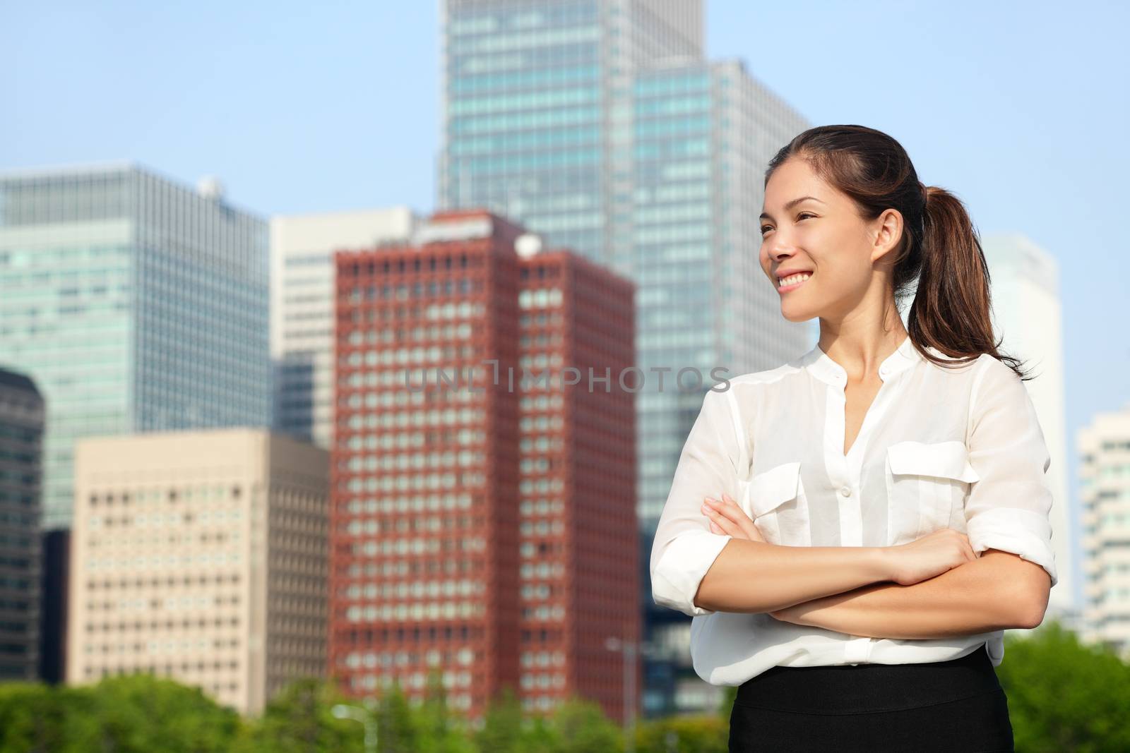 Asian young business woman portrait in Tokyo by Maridav