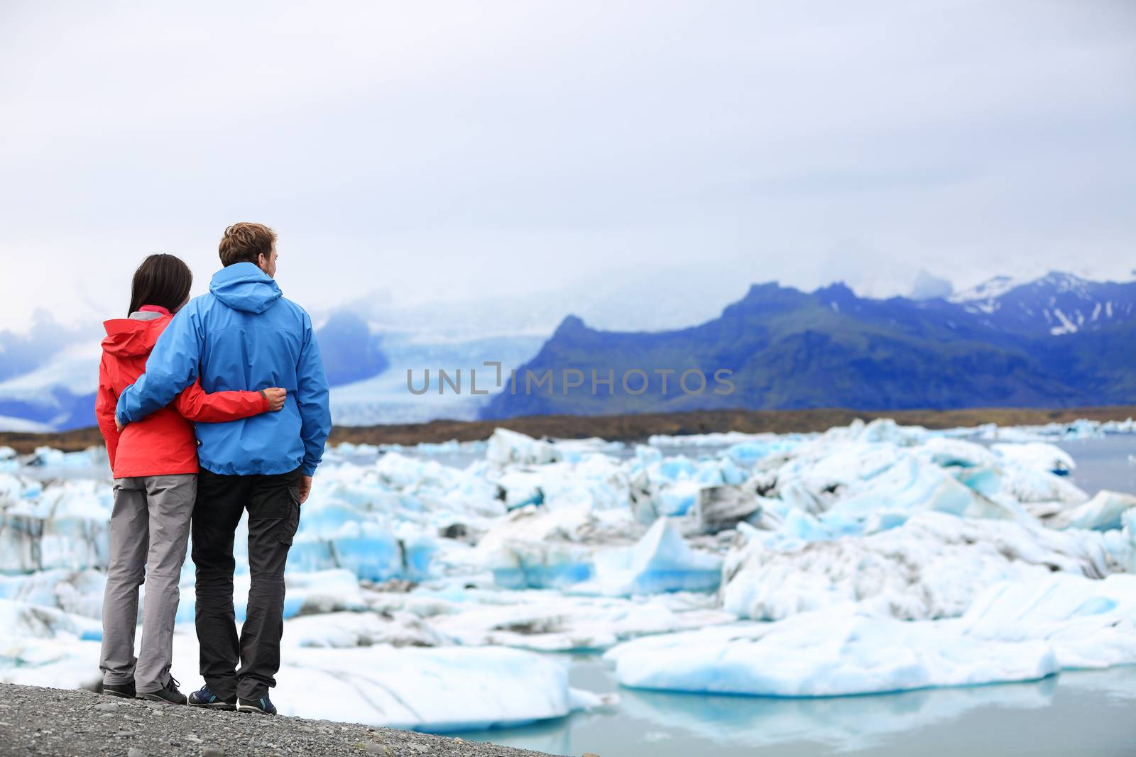 Tourists couple romantic on Iceland Jokulsarlon by Maridav