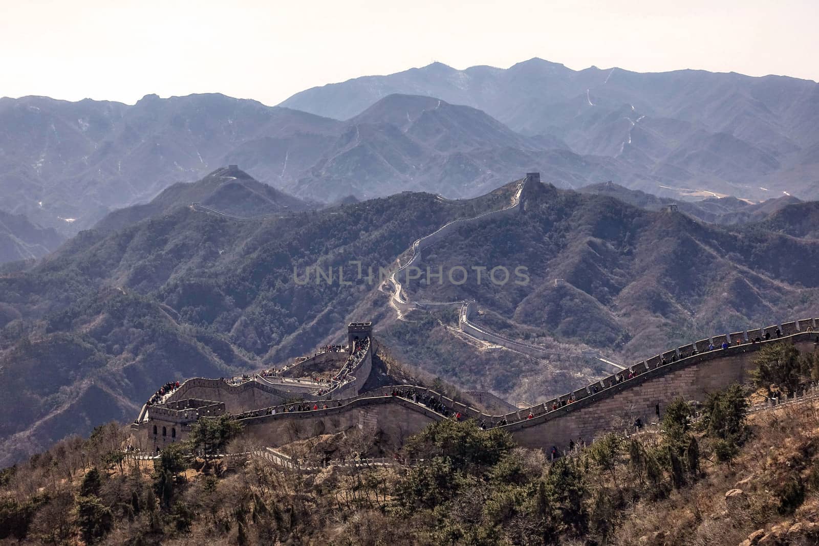Tourists visiting the Great Wall of China near Beijing.