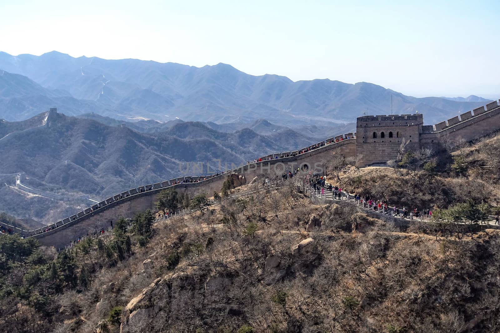 Tourists visiting the Great Wall of China near Beijing.