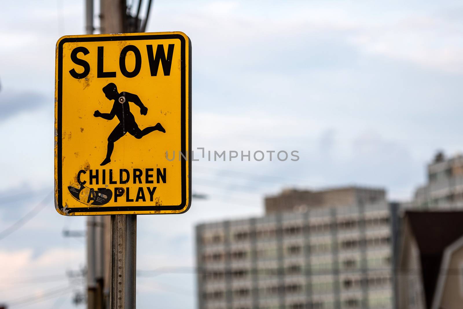 slow children caution sign on a street