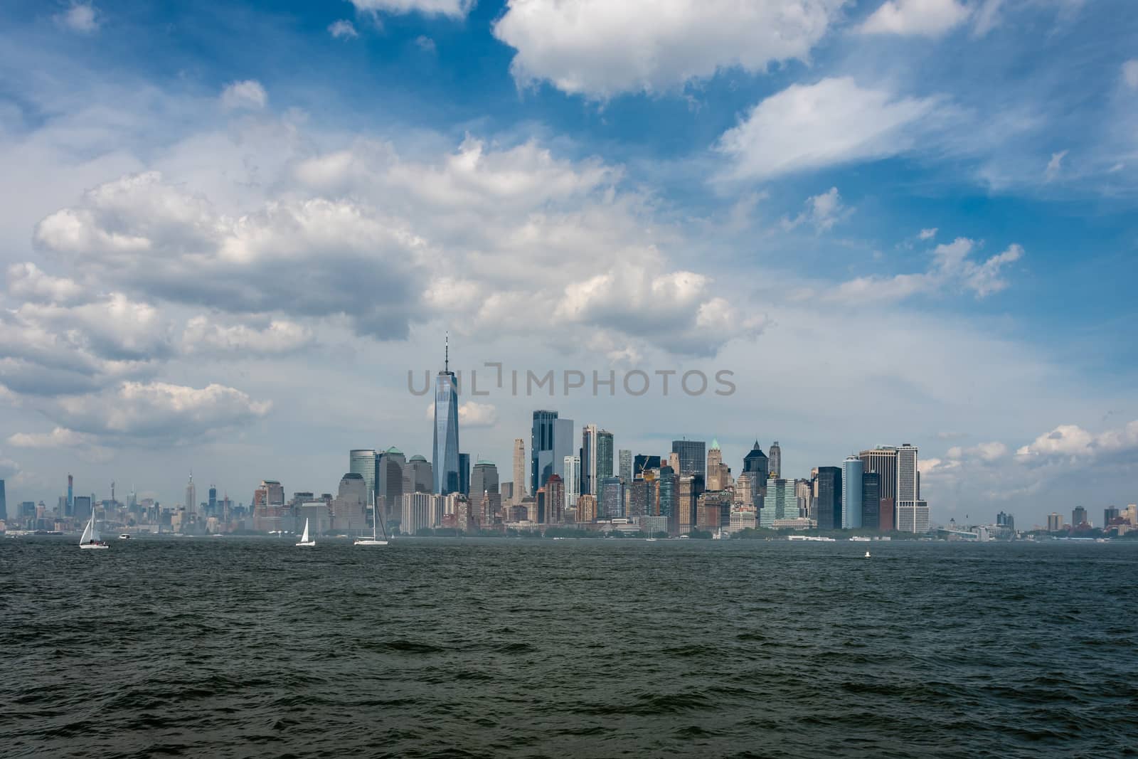 Skyline and modern office buildings of Midtown Manhattan viewed from across the Hudson River. - Image