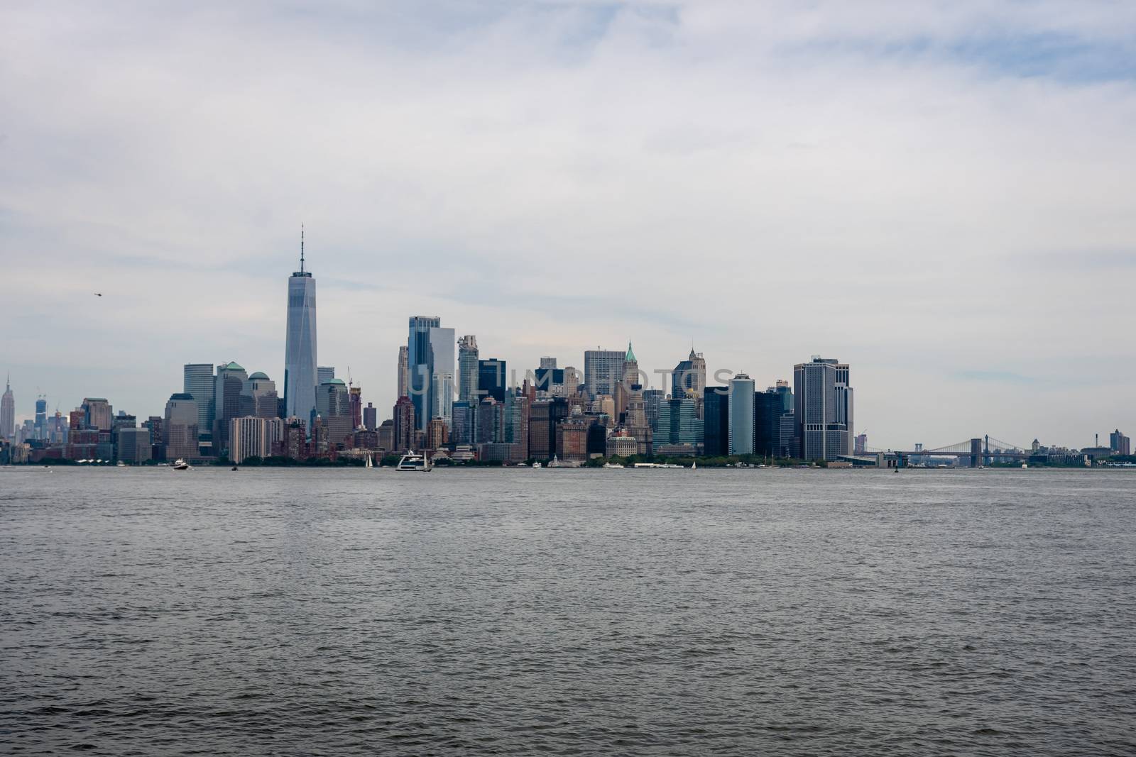 Skyline and modern office buildings of Midtown Manhattan viewed from across the Hudson River. - Image