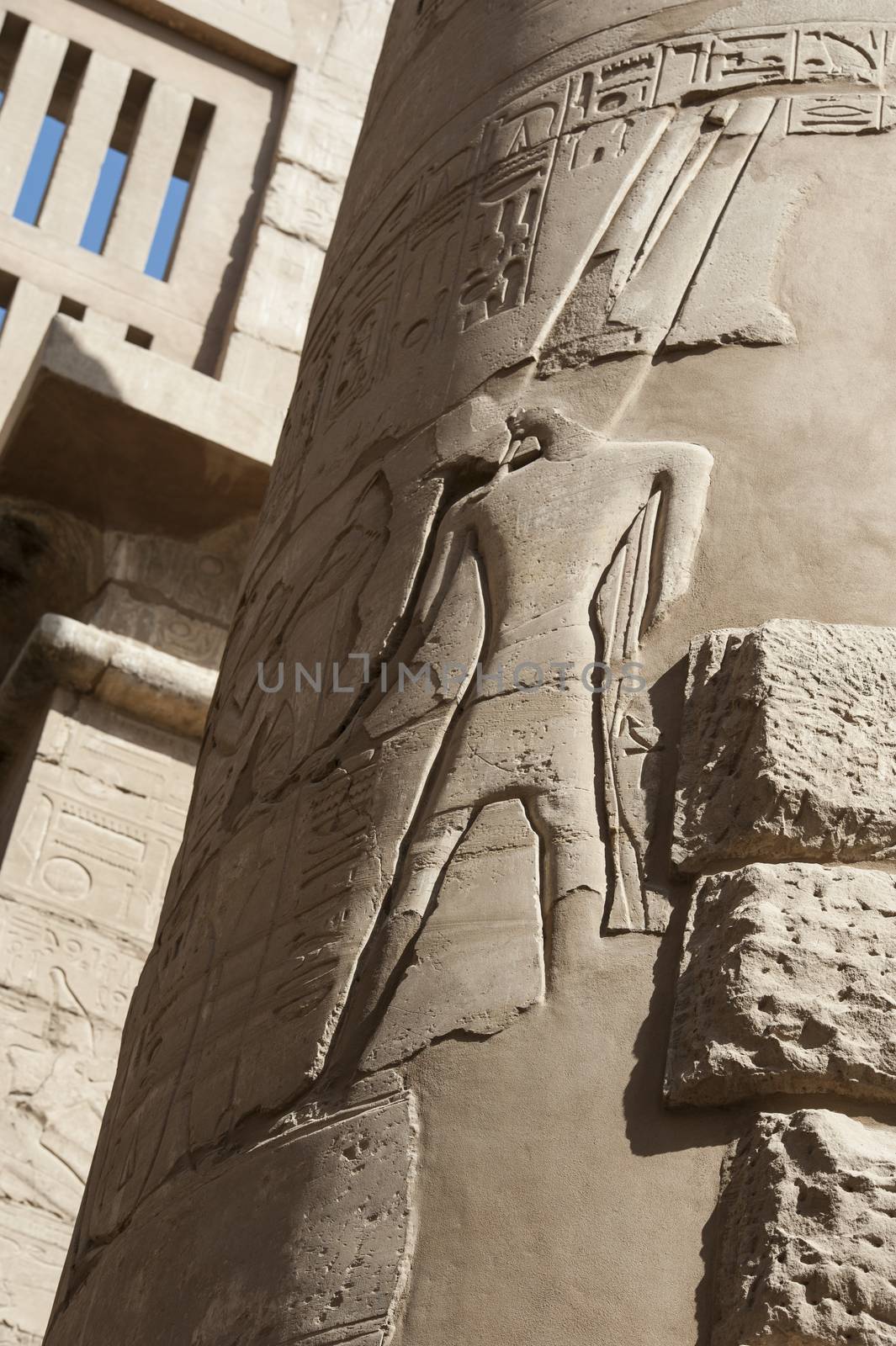 Closeup detail of a large column in hypostyle hall at the ancient temple Karnak Luxor