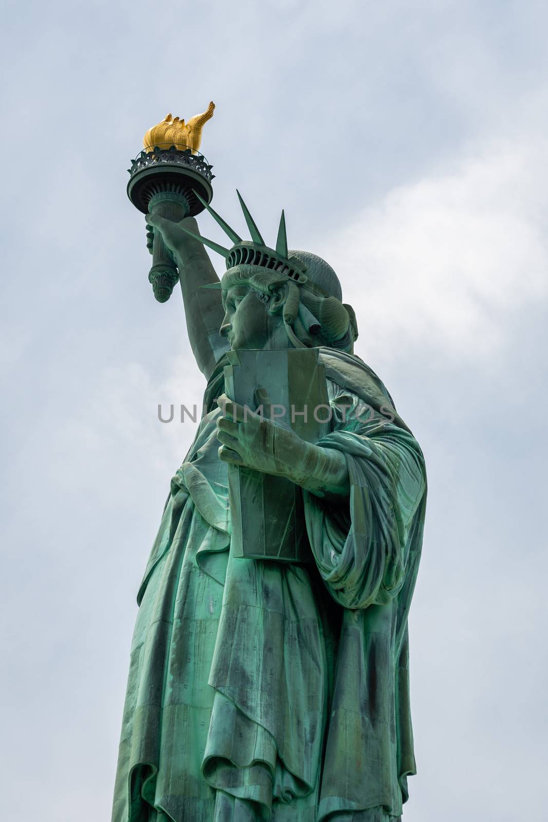 Statue of Liberty close up in a sunny day, blue sky in New York - Image