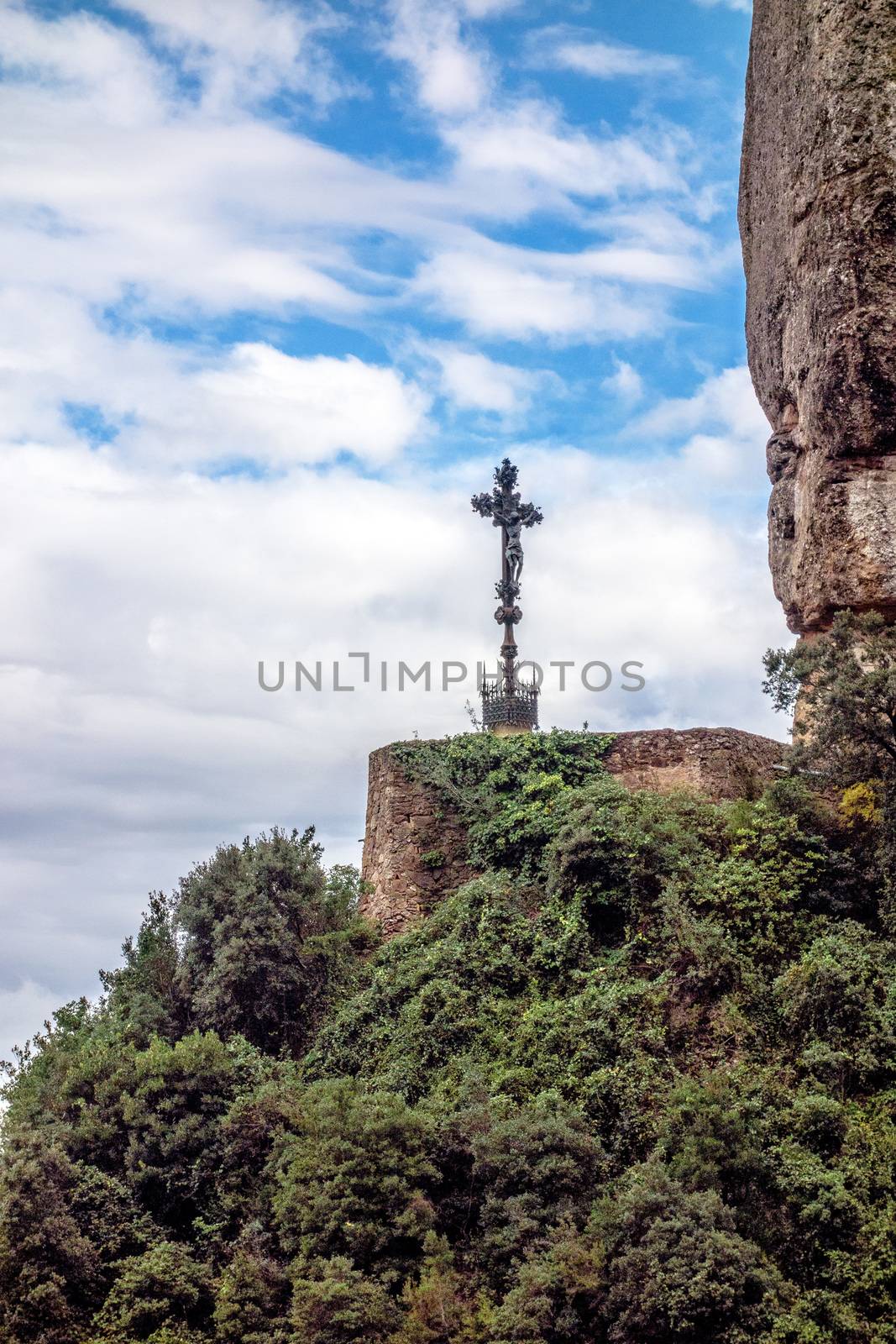 Barcelona Montserrat. Spain. Mountains, from afar visible place, mounted cross.