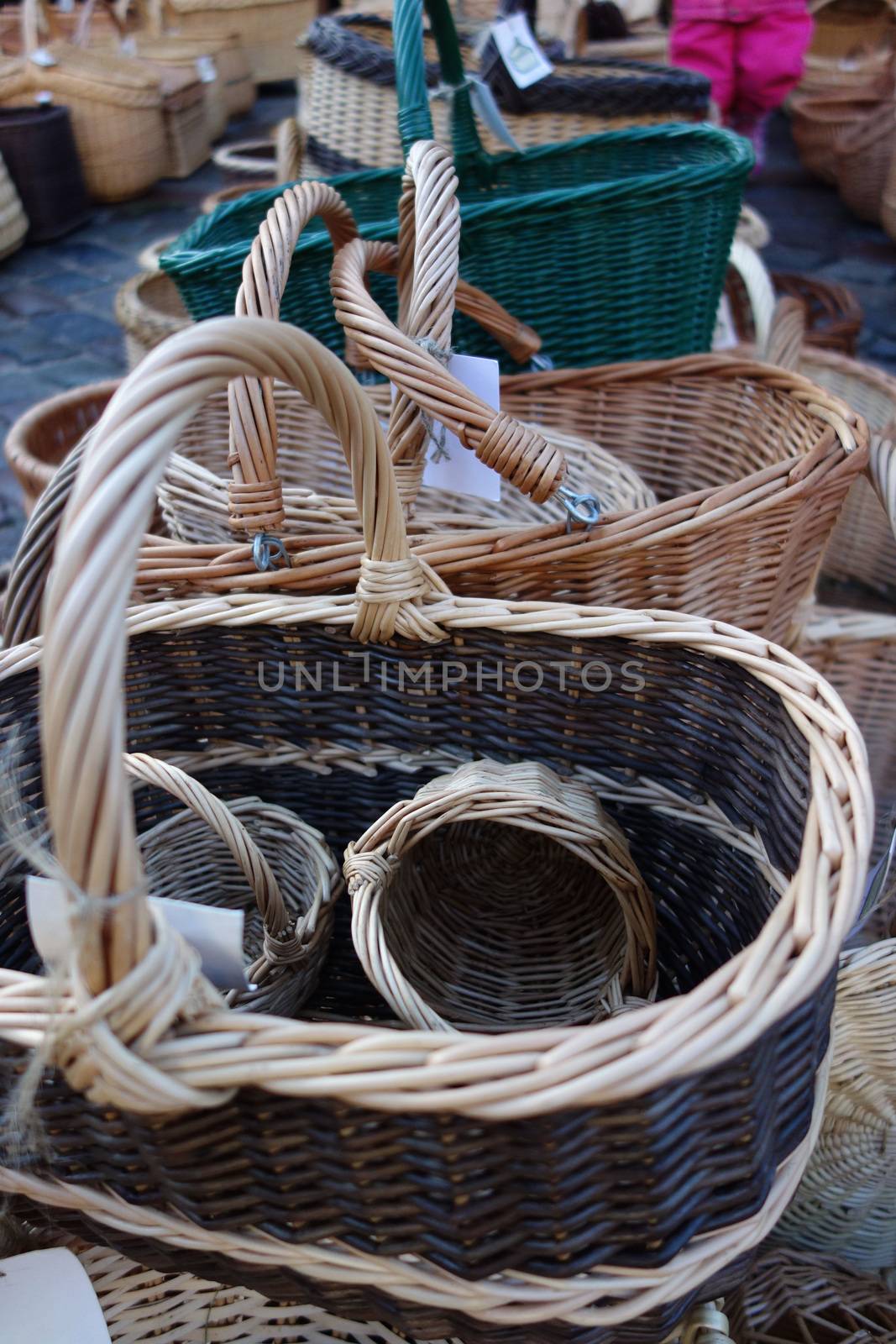 In the christmas  market a wide selection of a variety of hand-braided baskets.