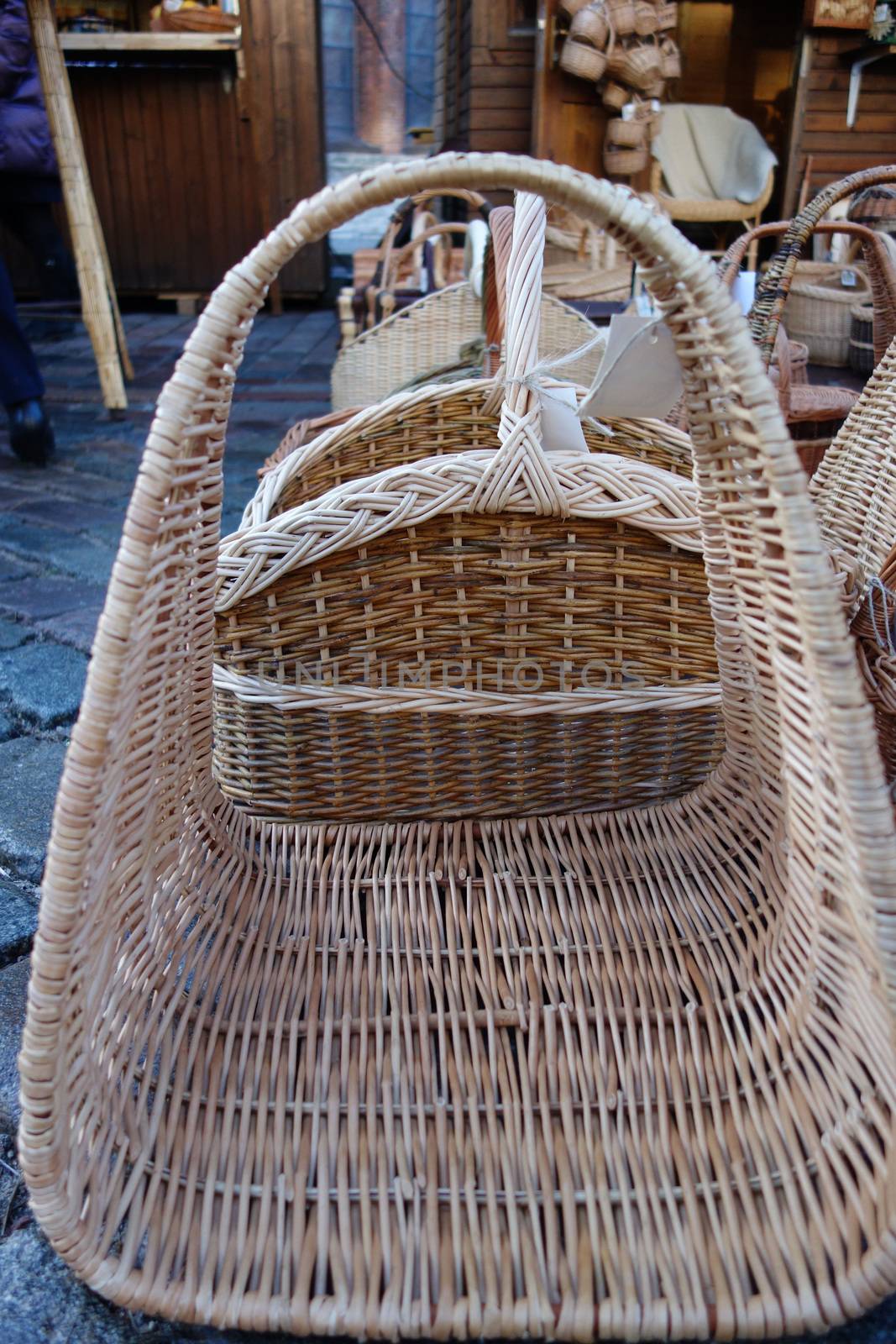 In the christmas  market a wide selection of a variety of hand-braided baskets.