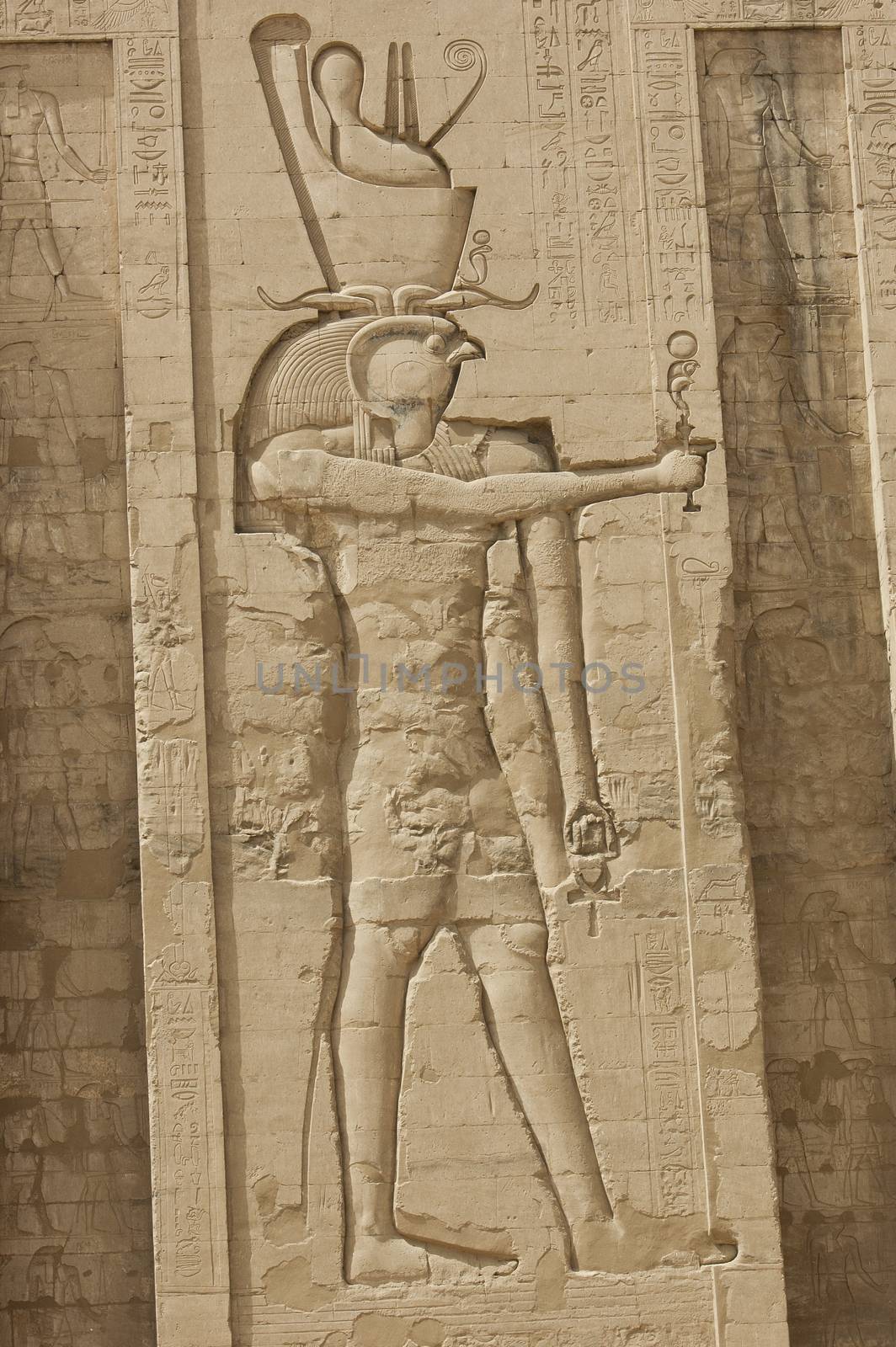Egyptian hieroglyphic carvings on a wall at the Temple of Edfu