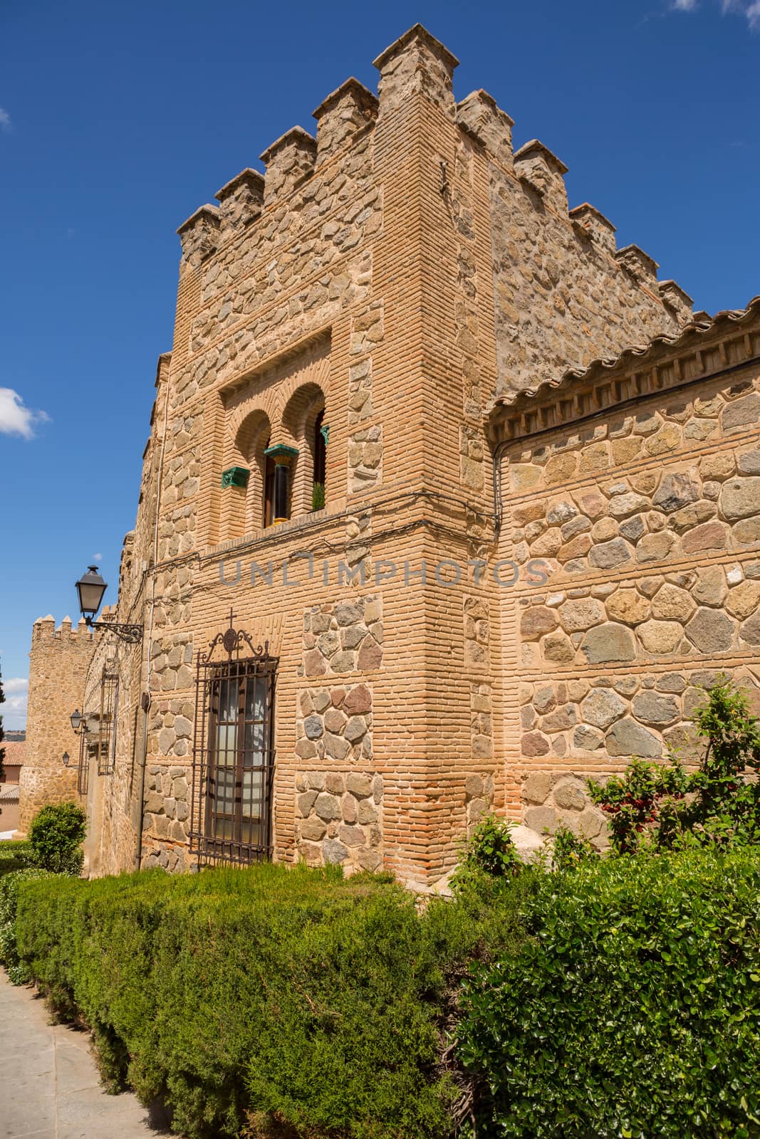 the medieval facade of the Palace de la Cava (16th century). Toledo, Spain