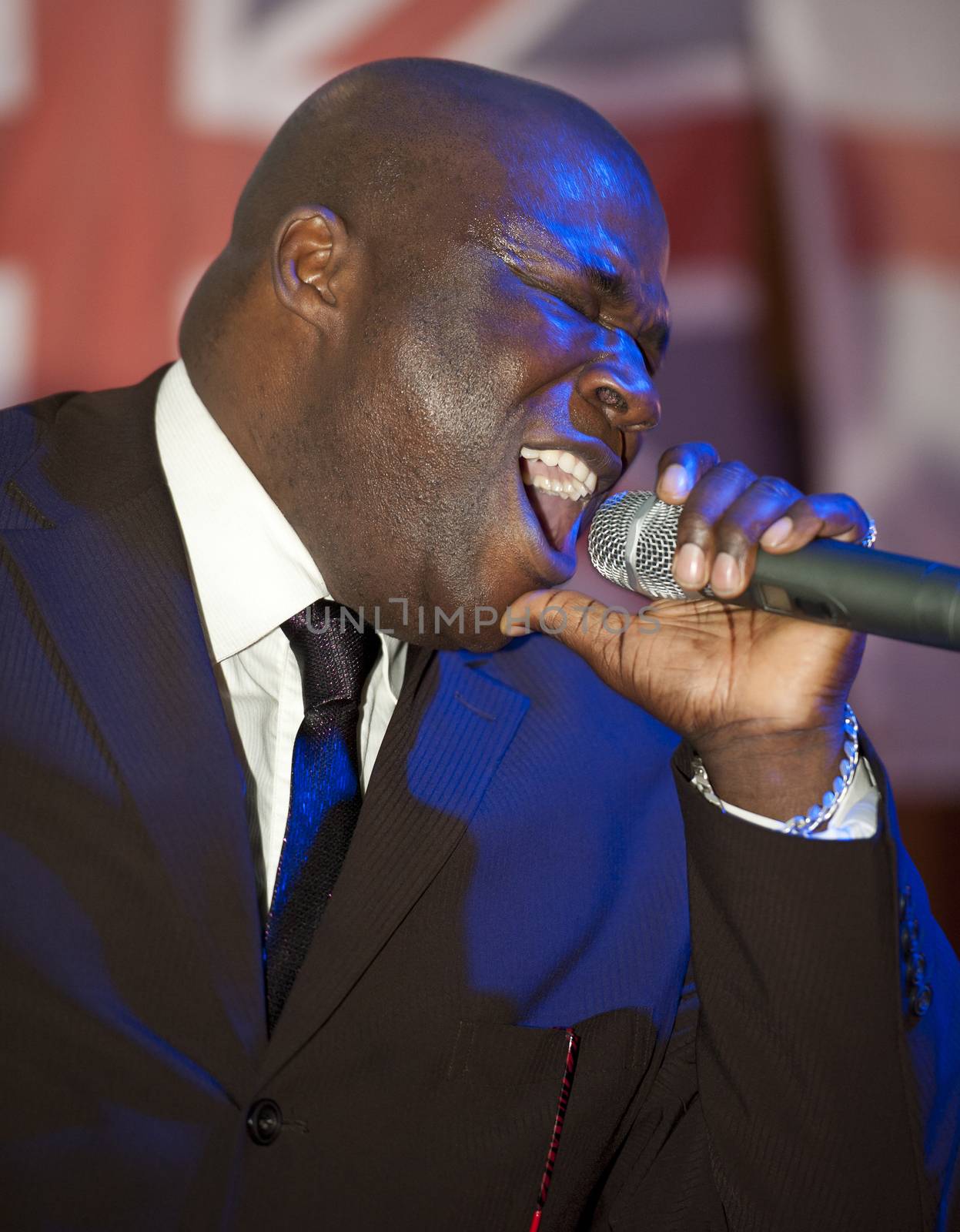 African male giving a live soul singing performance