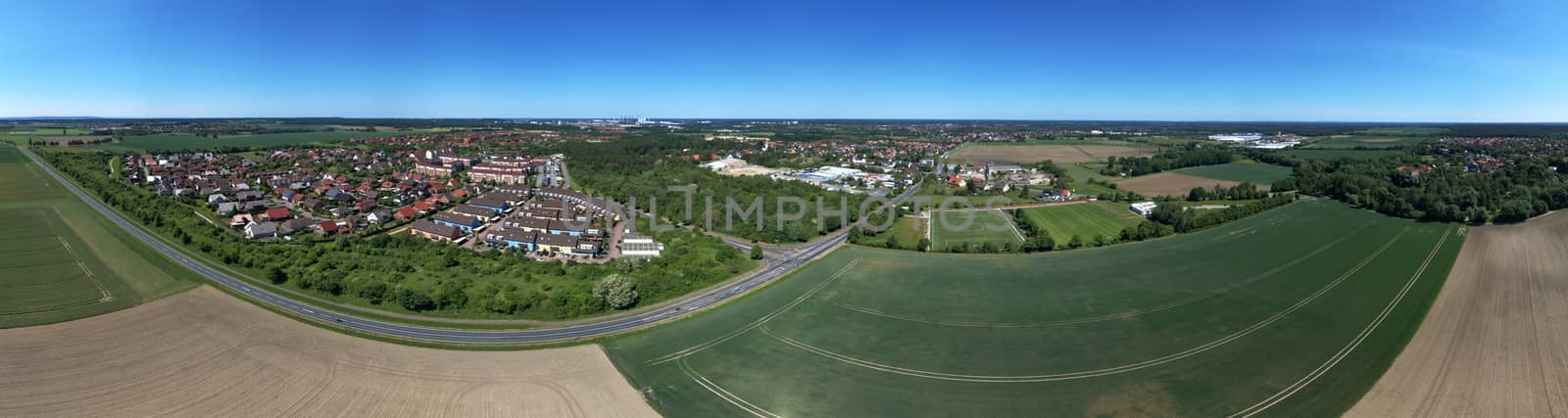 High resolution panorama of fields,meadows and a small village in the north of germany, aerial view, made with drone