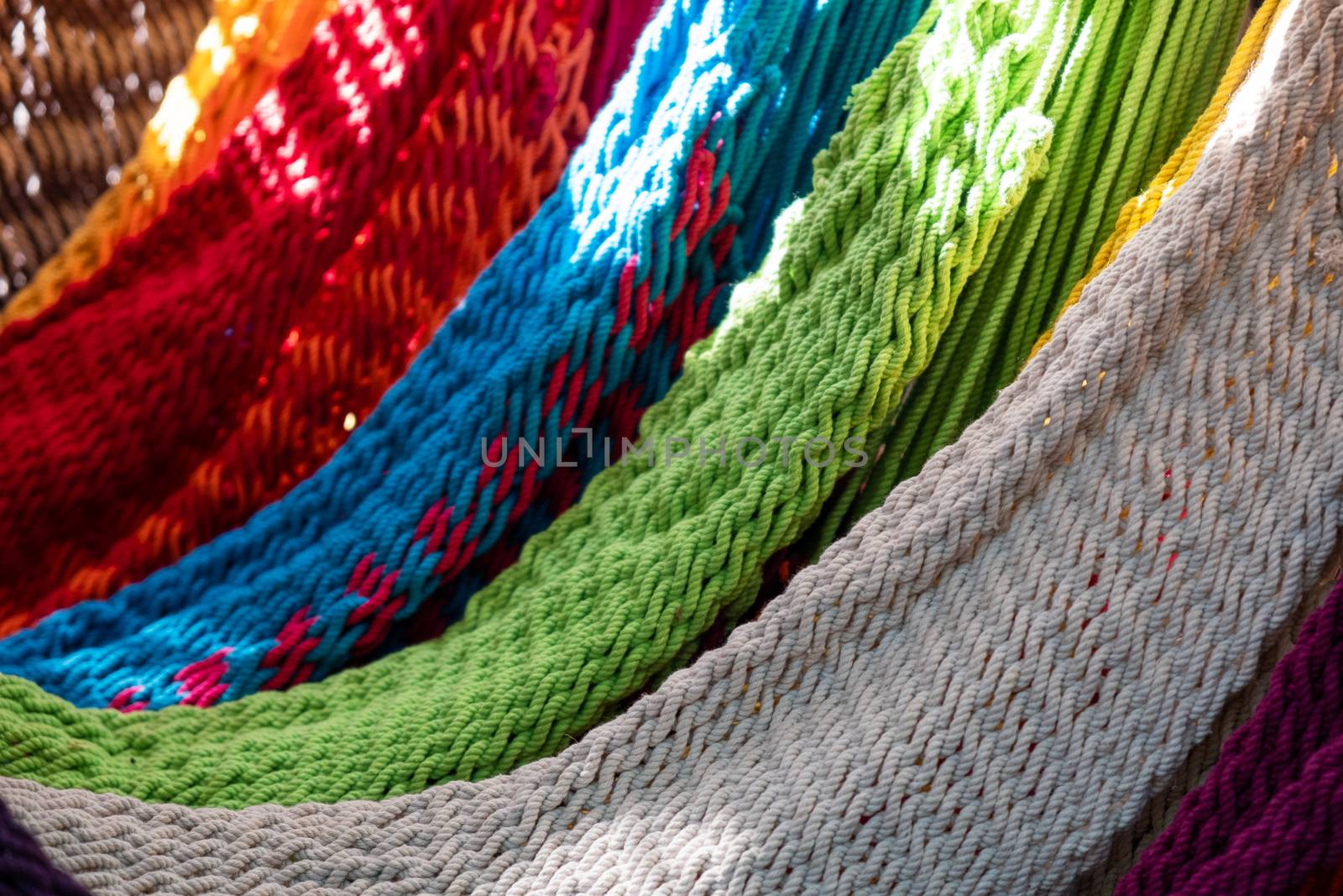 Close-up of multi-colored hammocks by snep_photo