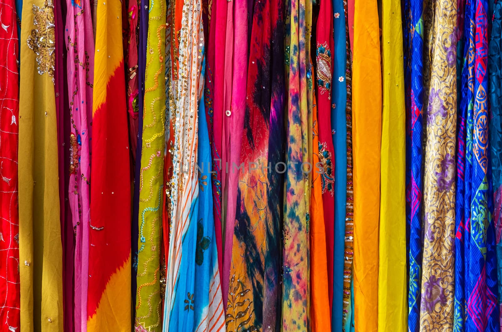 Close-up of multi-colored sari, open air market in India