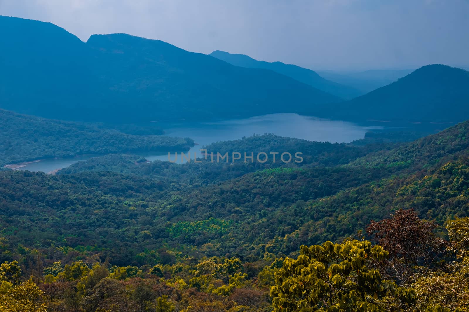 View on lake and mountains in Goa, India. by the road to Surla waterfall