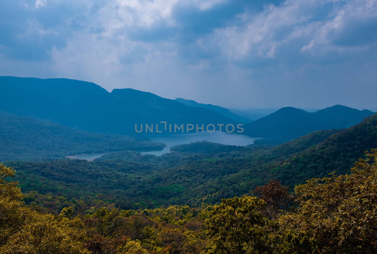 View on lake and mountains in Goa, India. by the road to Surla waterfall