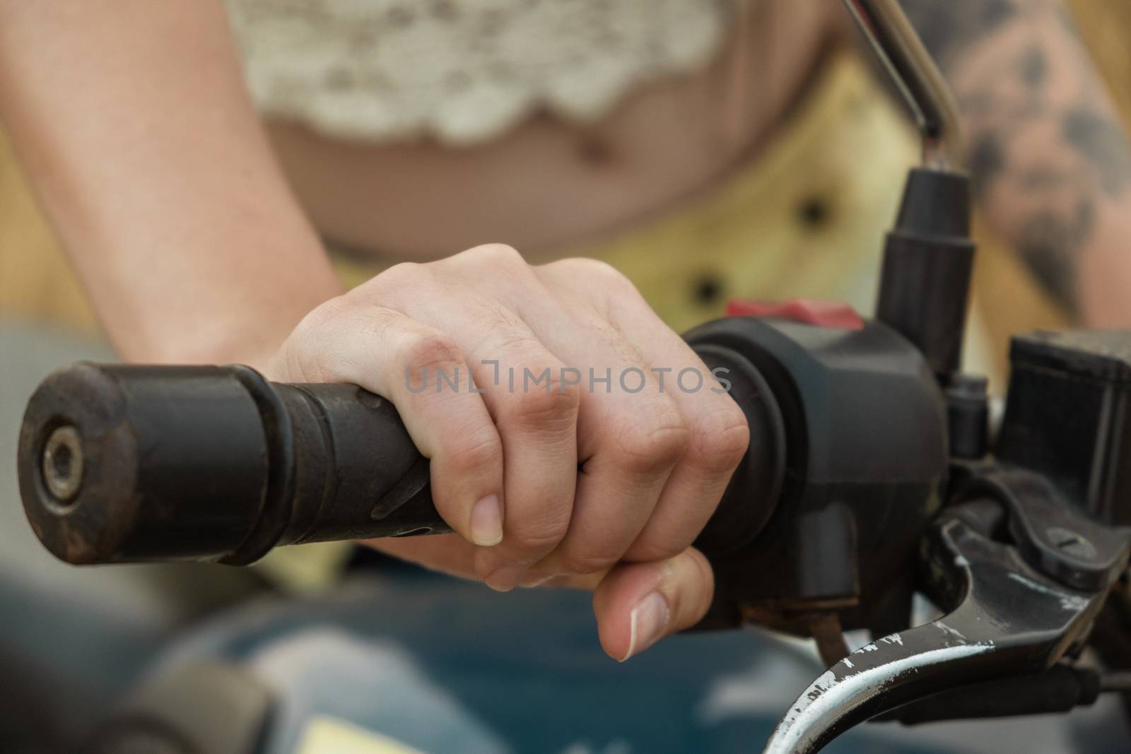 Woman Hand Riding Motorcycle by snep_photo