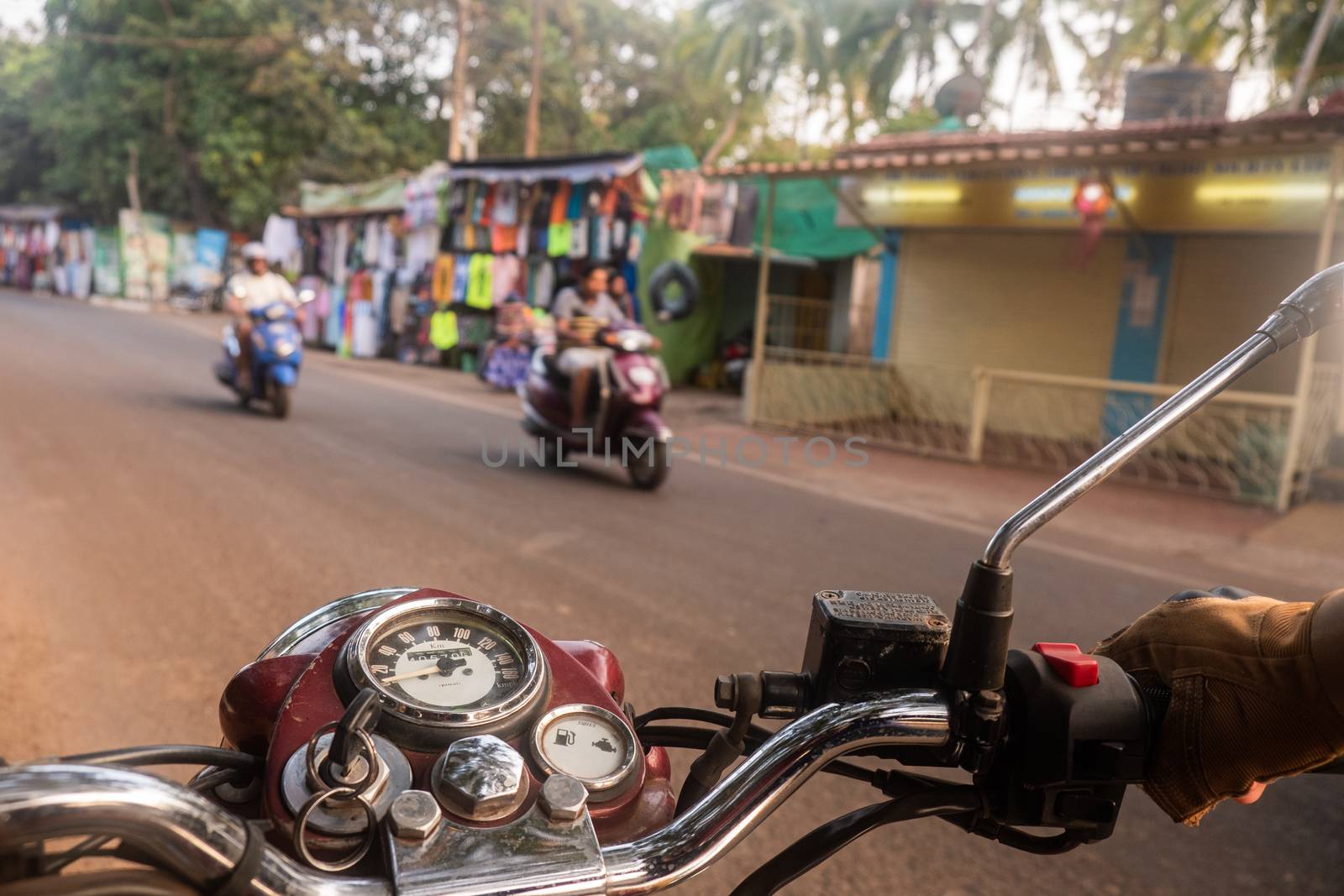 Driving a motorcycle in India by snep_photo