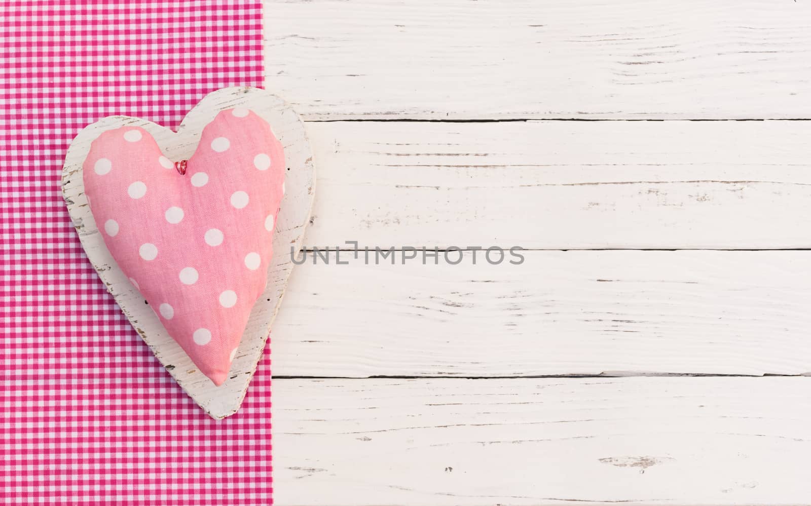 Baby girl birthday greeting card background with pink heart and copy space