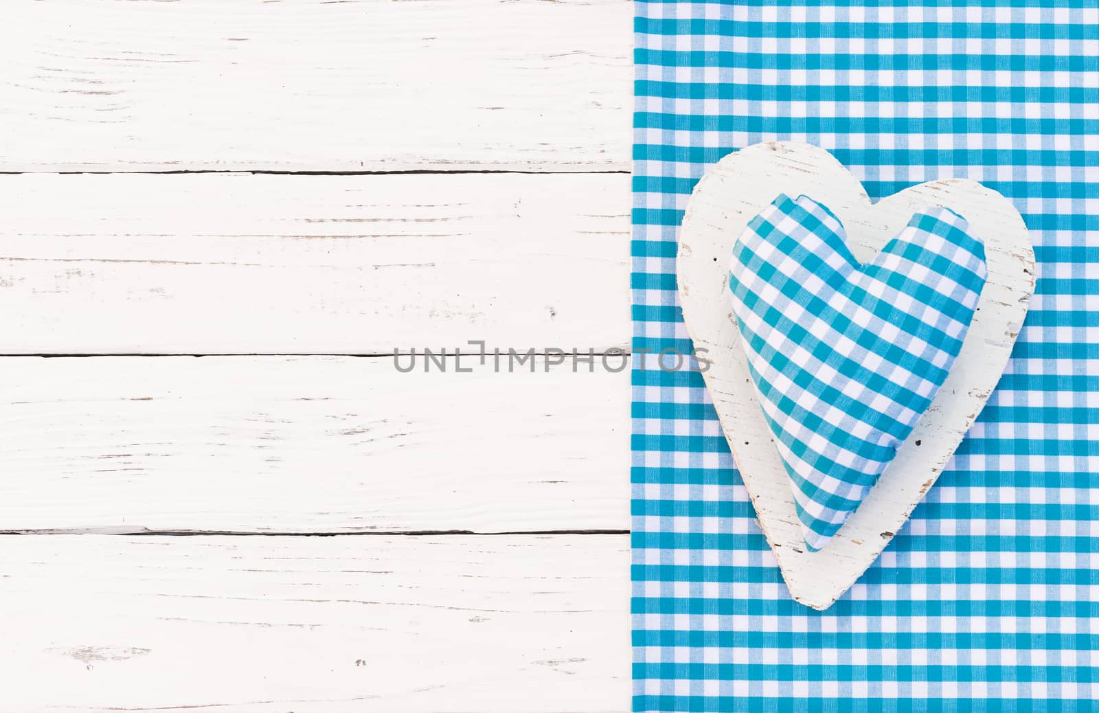 Baby boy birthday greeting card background with blue heart and copy space

