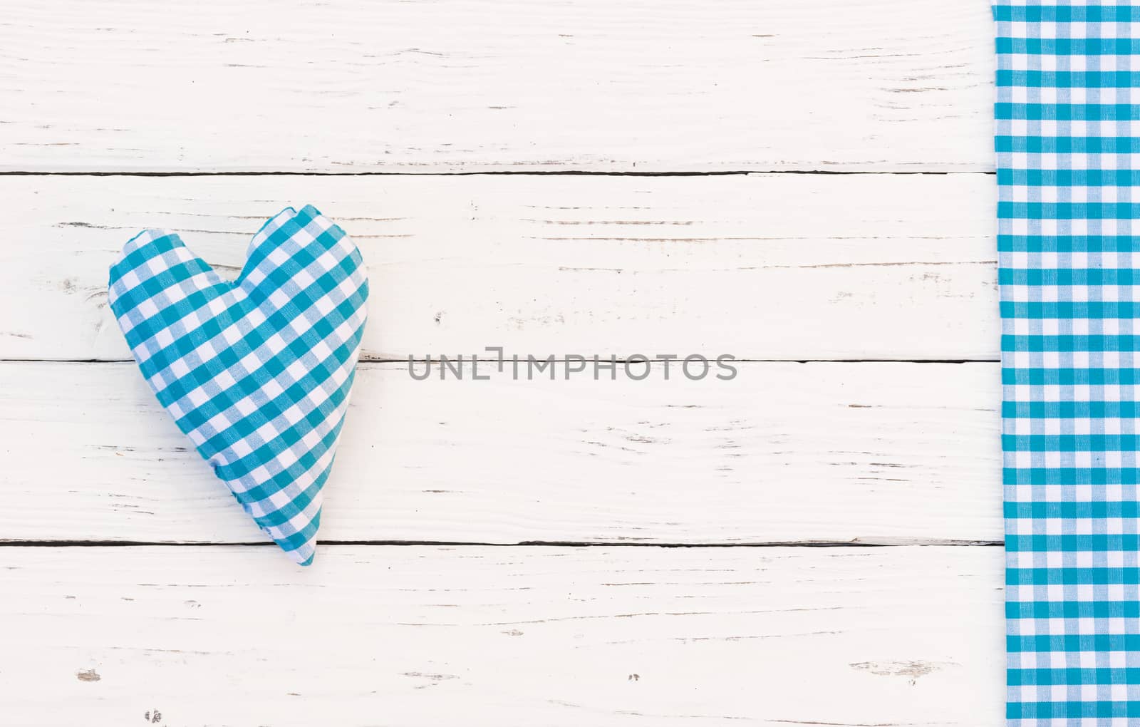 Baby boy birthday greeting card background with blue heart and copy space

