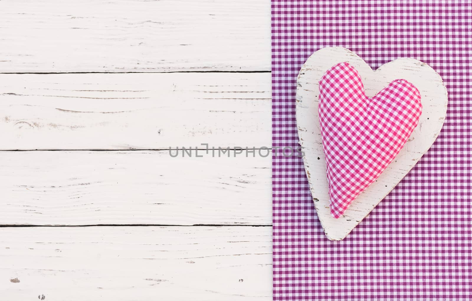 Pink fabric heart background for Mothers day with copy space