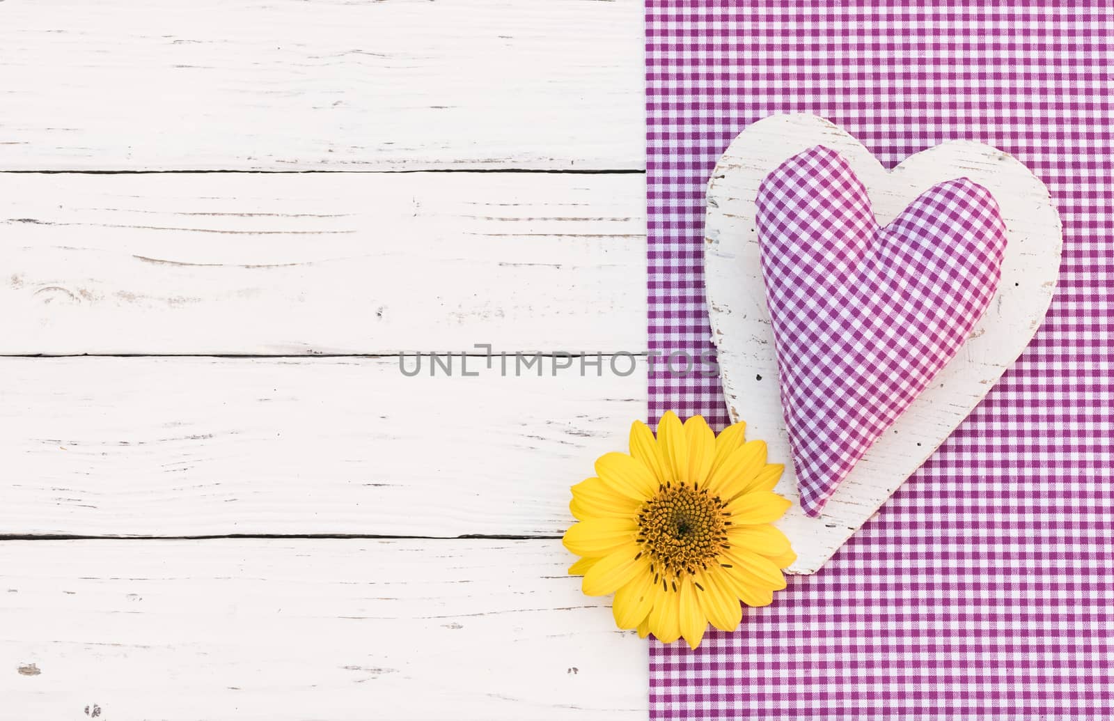 Heart with blossom on white wood background by Vulcano