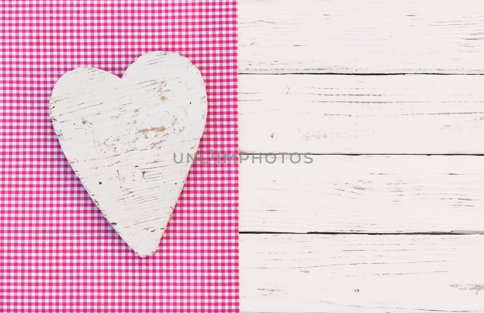 Romantic white heart on wood background for Valentine card with copy space