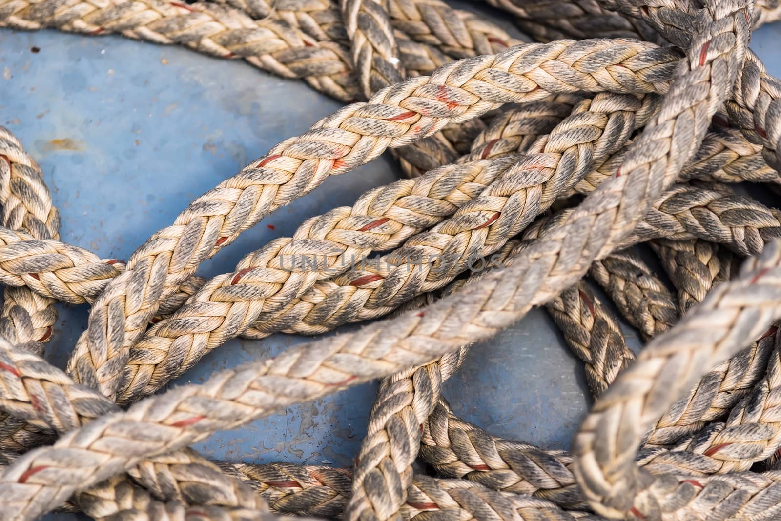 Background texture of coiled marine or nautical rope by Bubbers