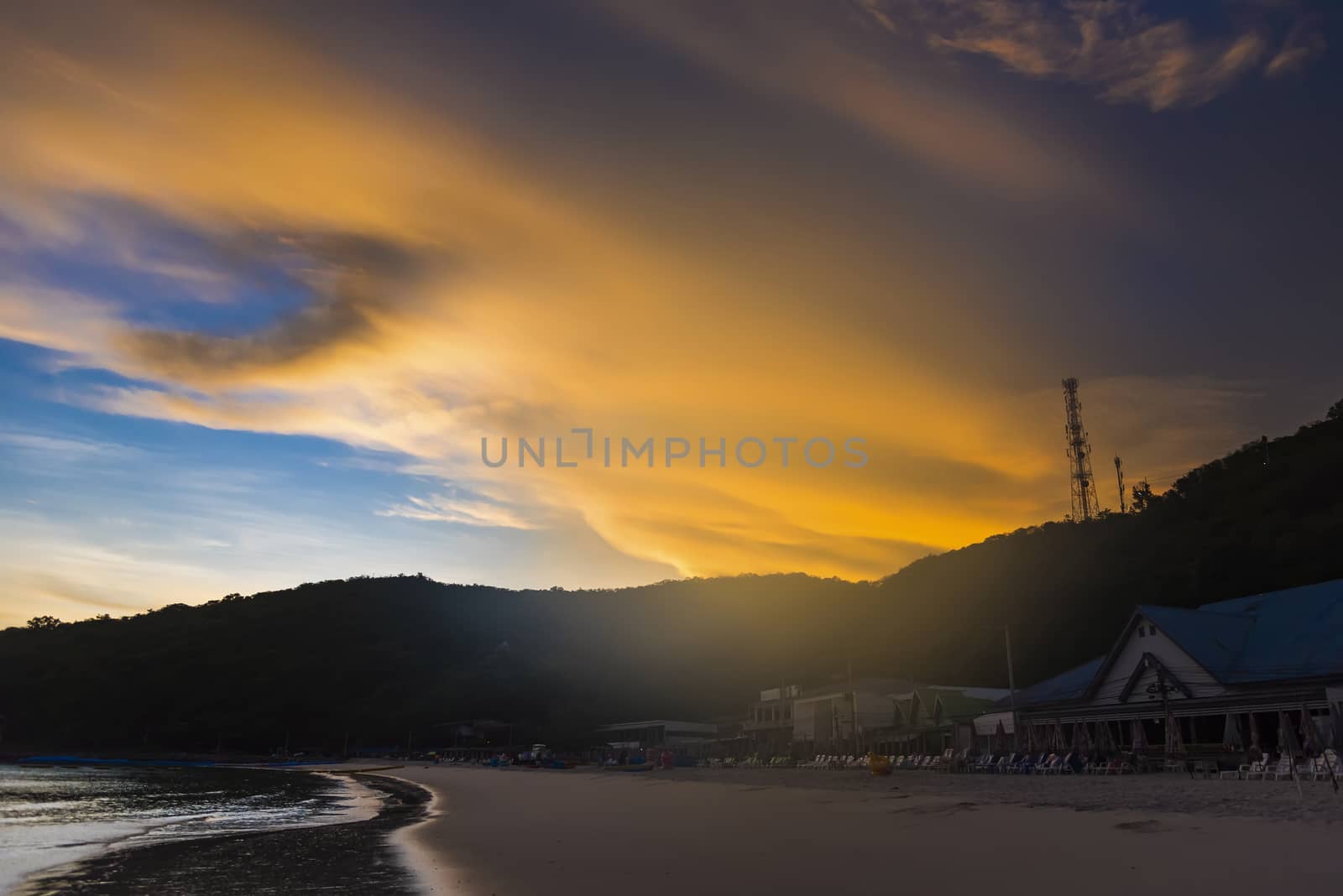 Chon Buri, Thailand - June, 28, 2020 :  Pictures of Tawaen Beach in the dawn, the sun was rising, morning sunrise  time on Koh Lan island after the outbreak of the Covid 19 virus.
