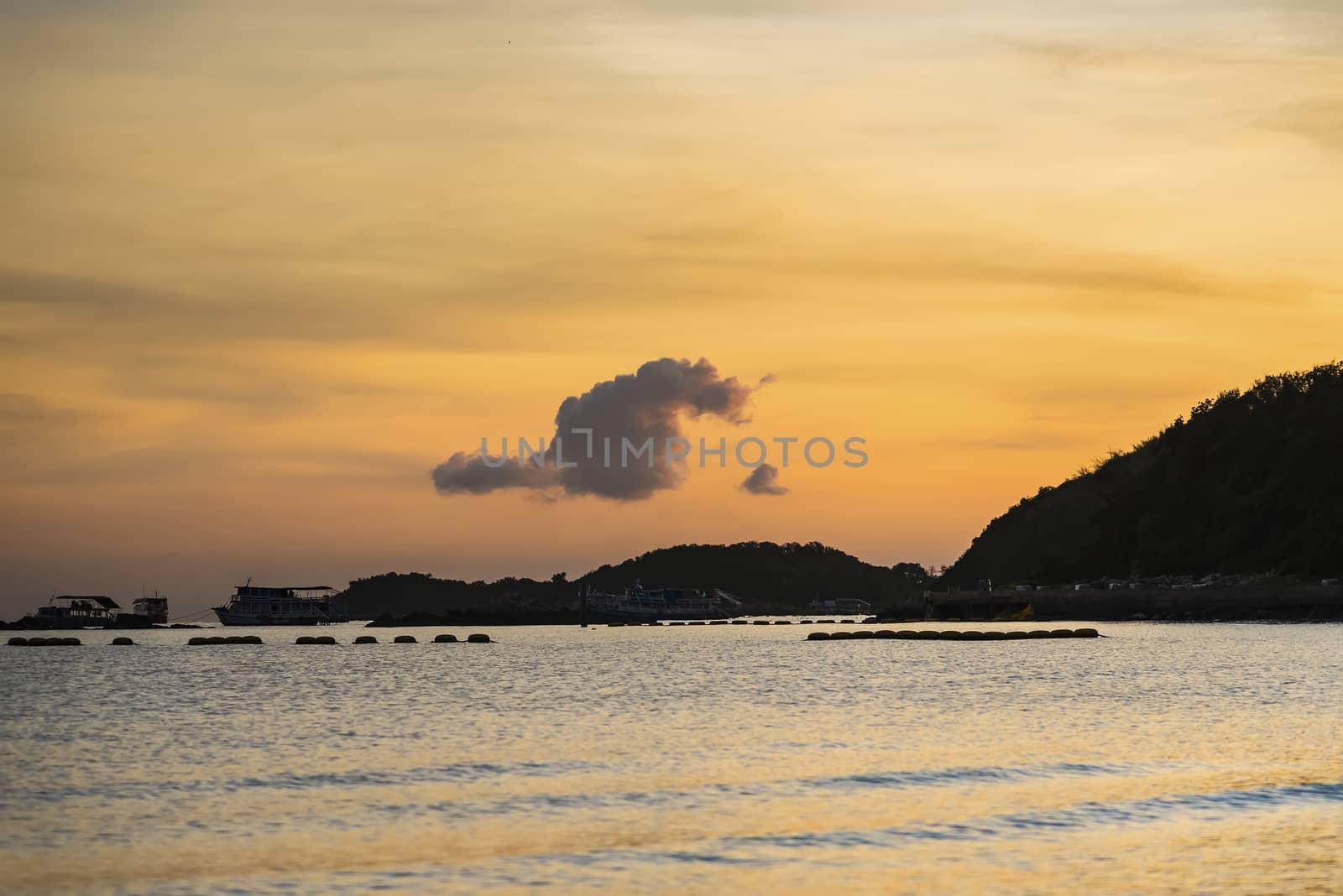 Pictures of Tawaen Beach in the dawn, the sun was rising, morning sunrise  time on Koh Lan island after the outbreak of the Covid 19 virus.