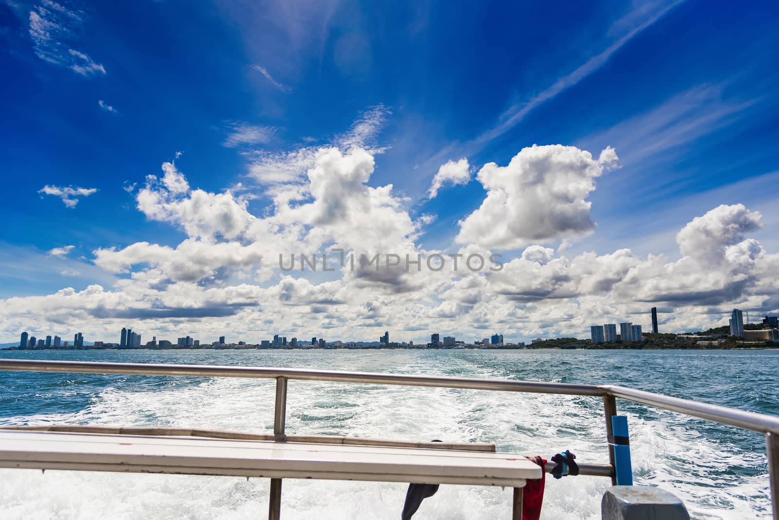 Water blue ocean splash and boat in the sea way ,Waves splashing on the side of ship