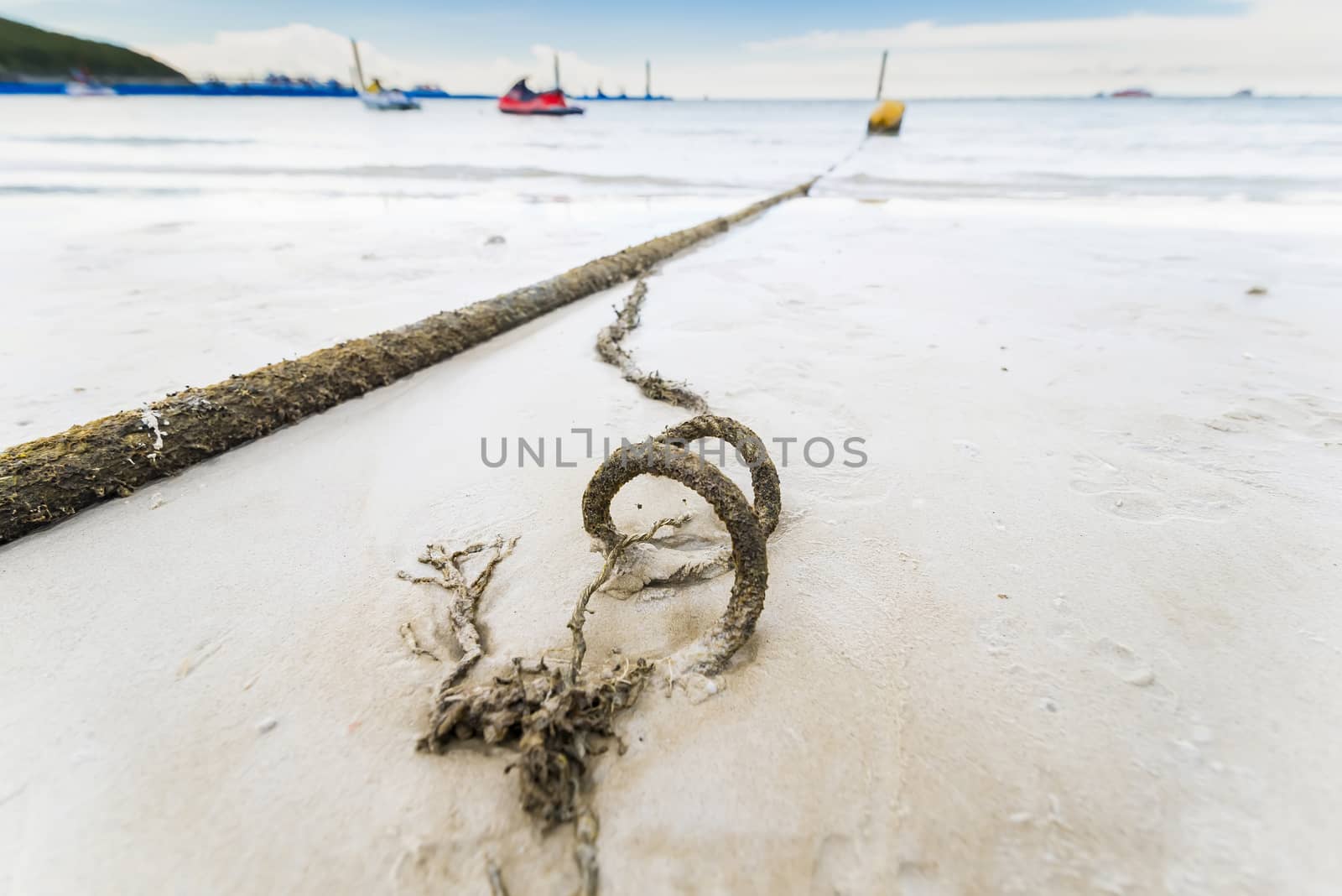 Broken marine rope and sea in background by Bubbers