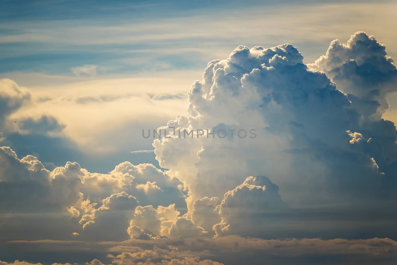 Colorful dramatic sky with cloud at sunset.