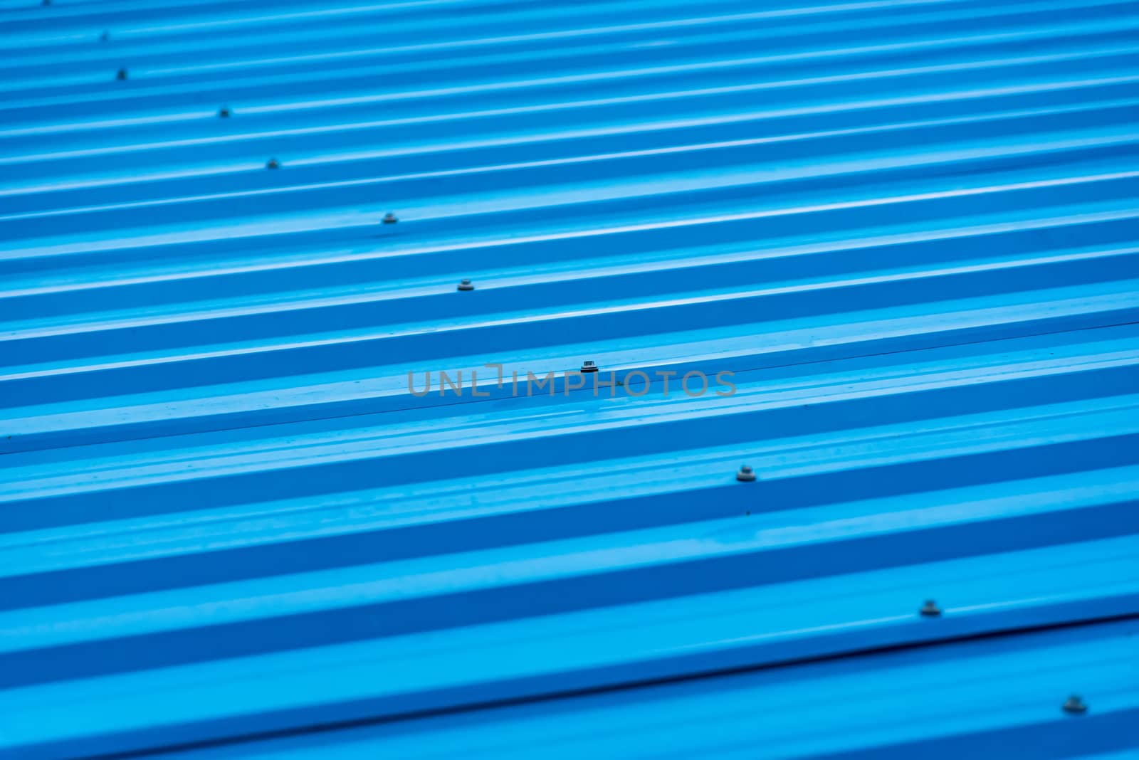 Blue painted metal roof as an abstract background