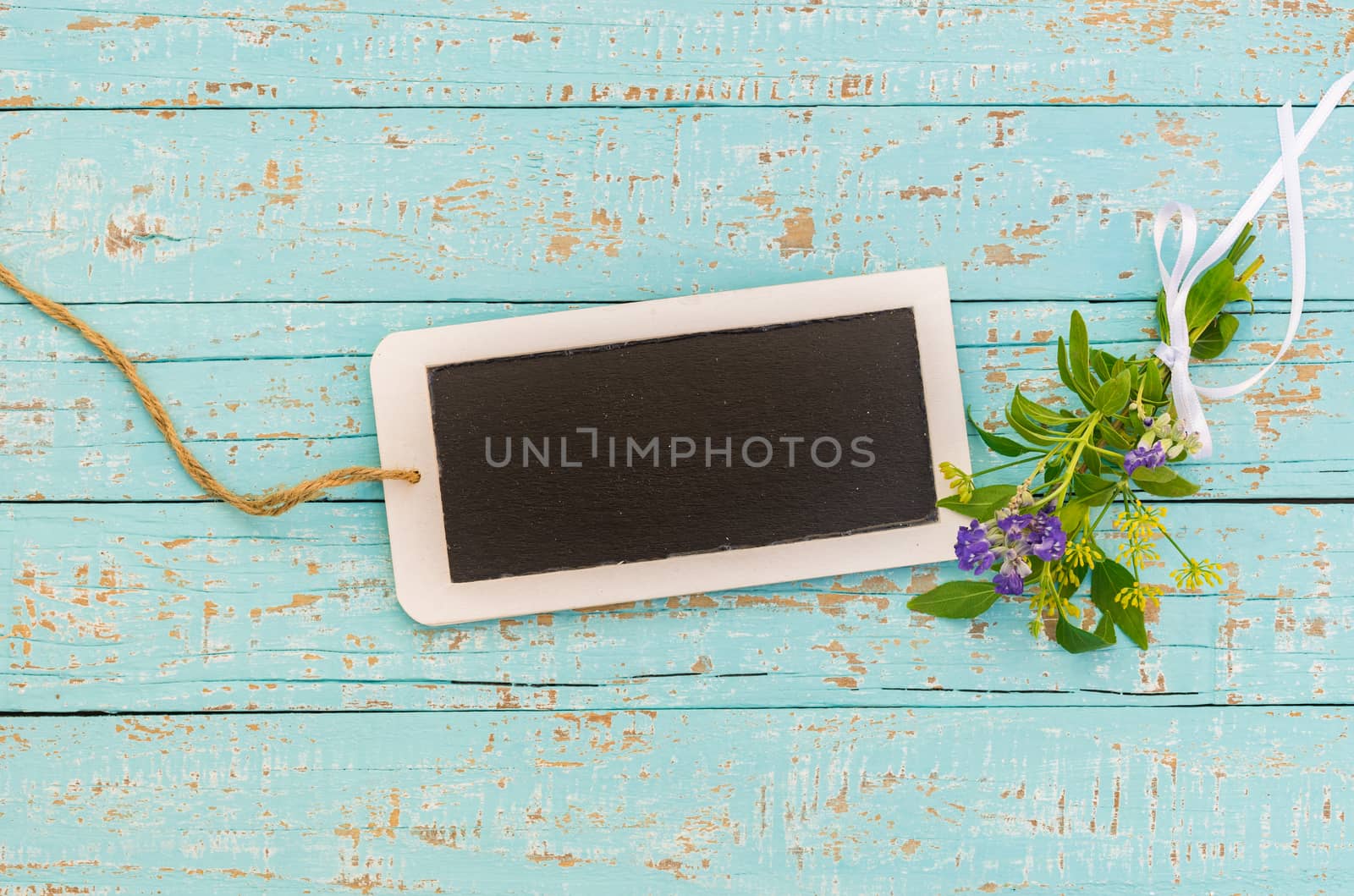 Small empty blackboard for a message for mothers day or birthday greetings