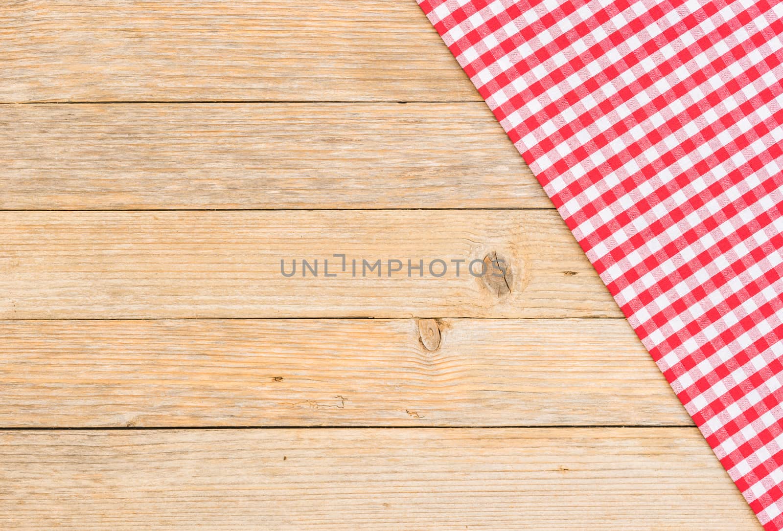 Table background with rustic red tablecloth and serving size