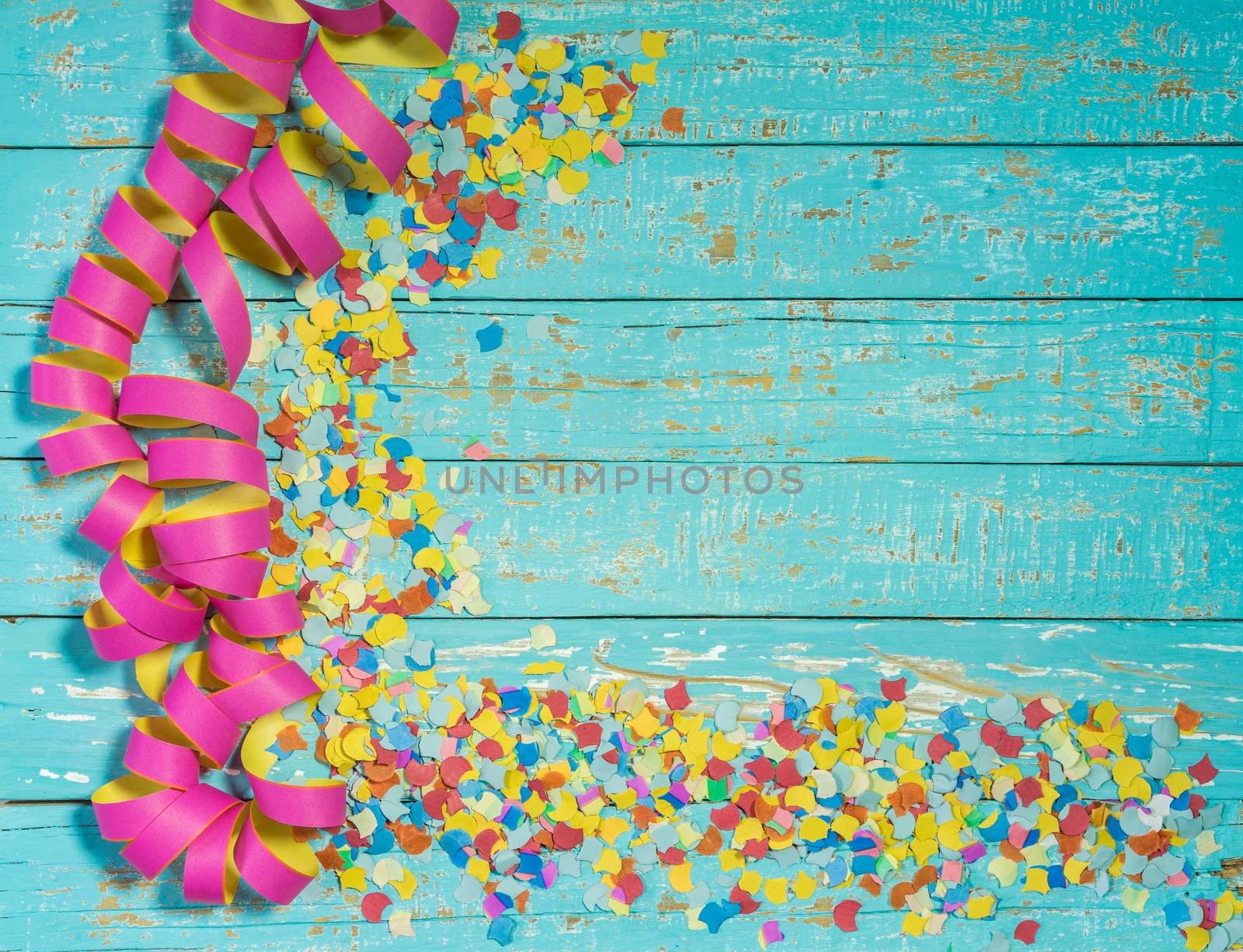 Colorful party, birthday or carnival celebration background with streamers and confetti decoration
