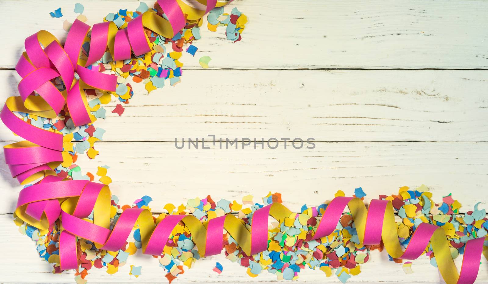 Celebration background with colorful streamers and confetti decoration