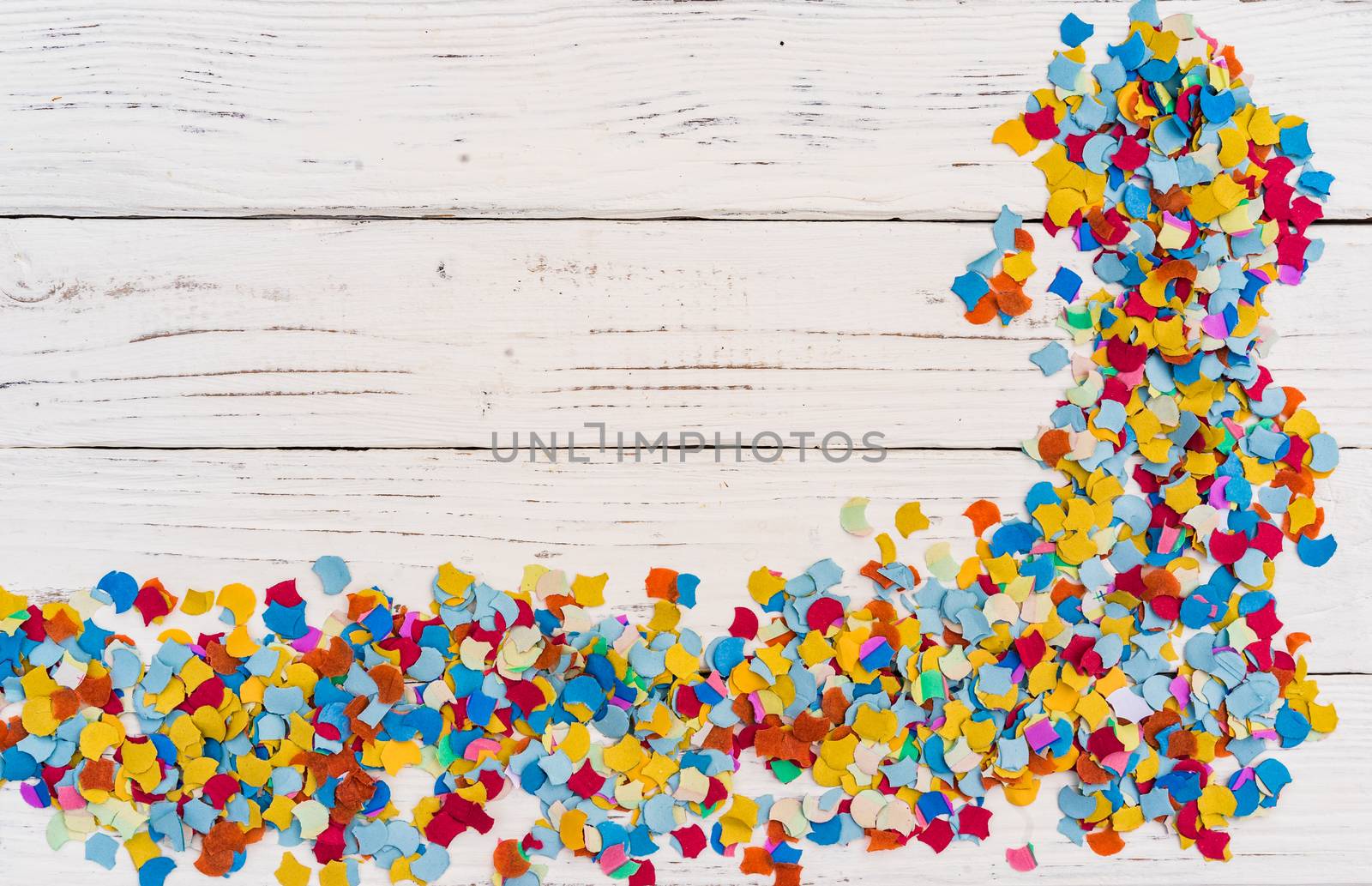 Confetti decoration on white background for party, birthday or carnival celebration