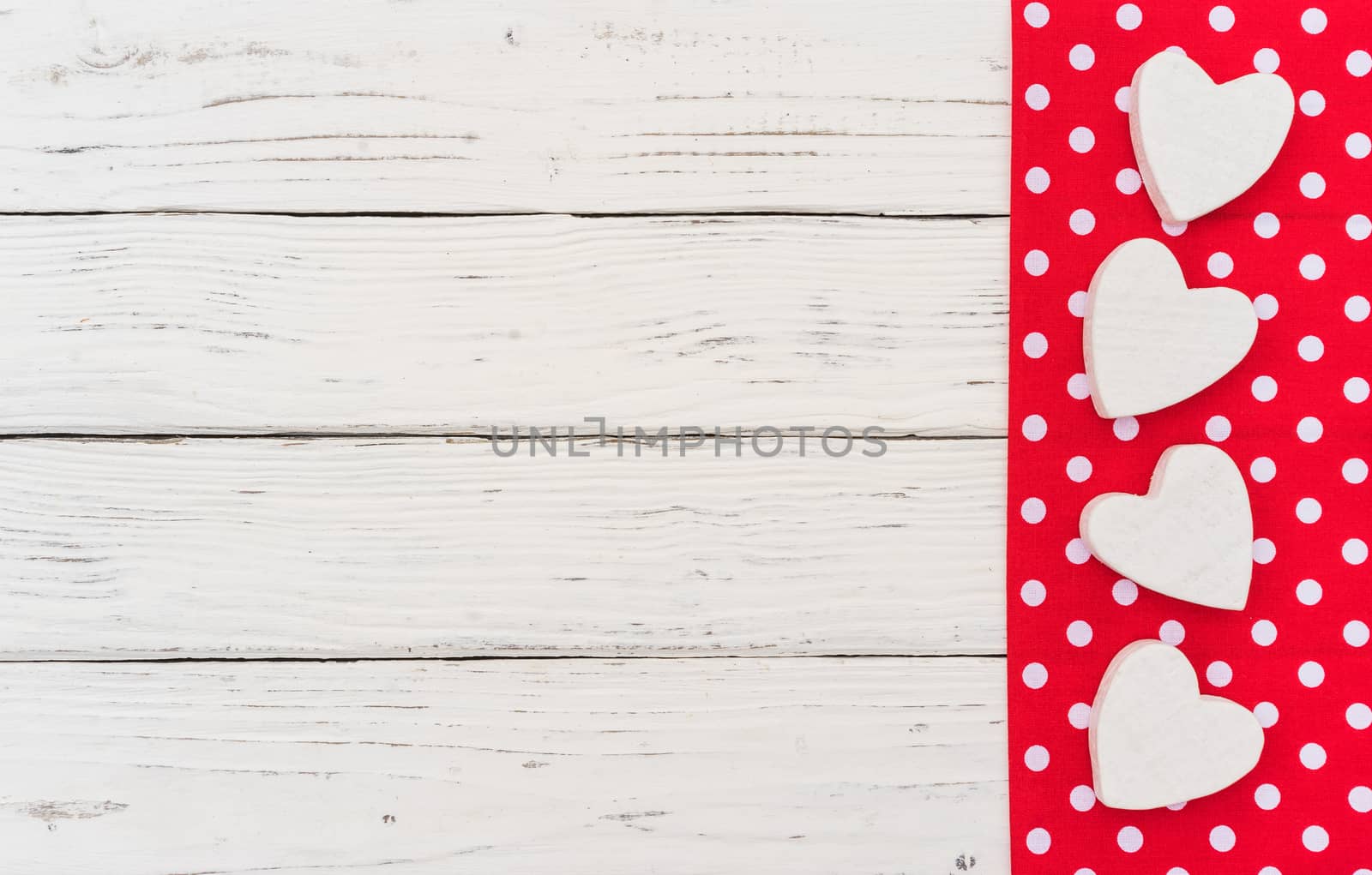 Valentine card with frame of hearts  with red fabric border on white background  with copy space