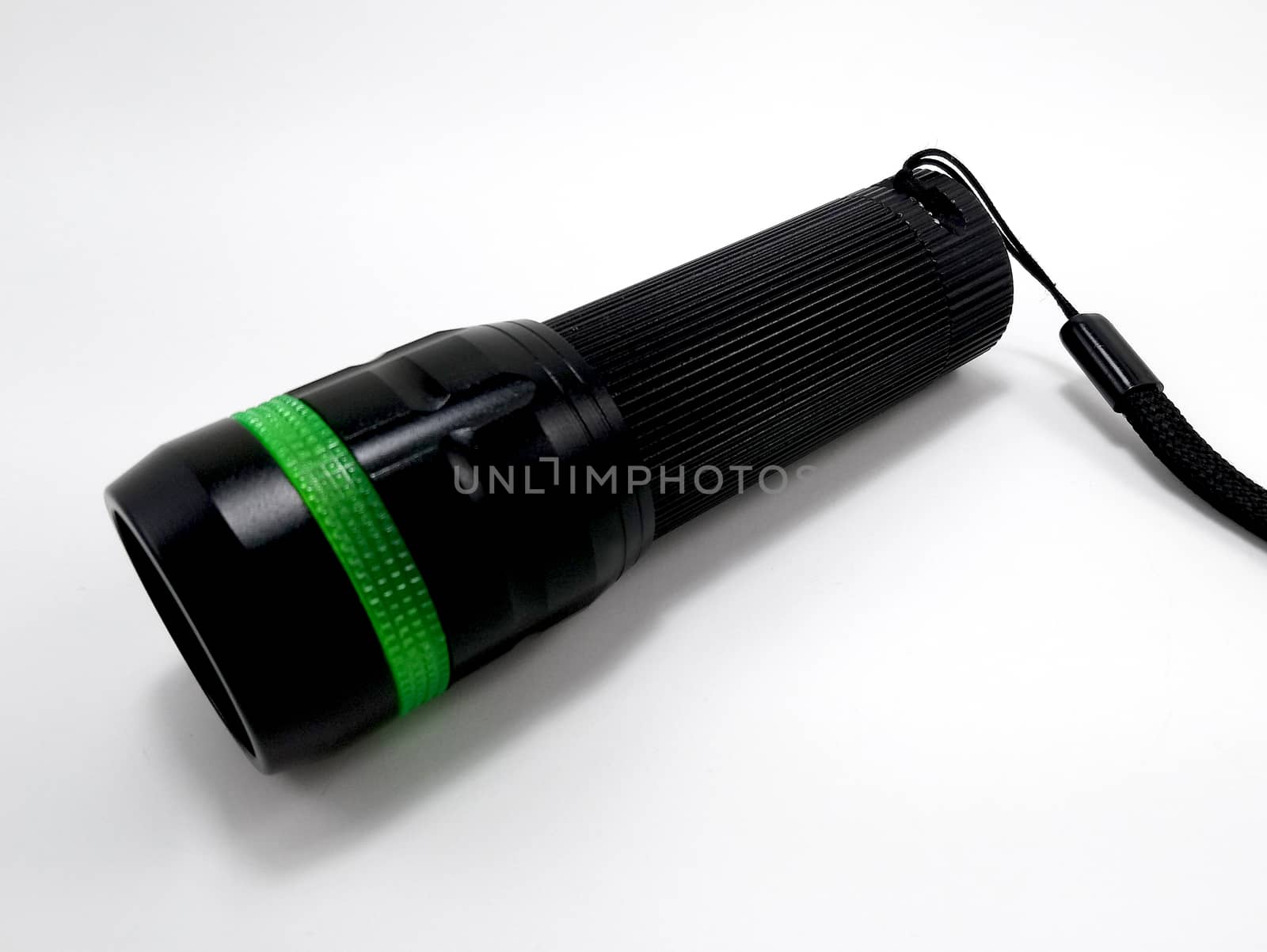 Black portable light emitting diode battery operated flashlight with hand strap