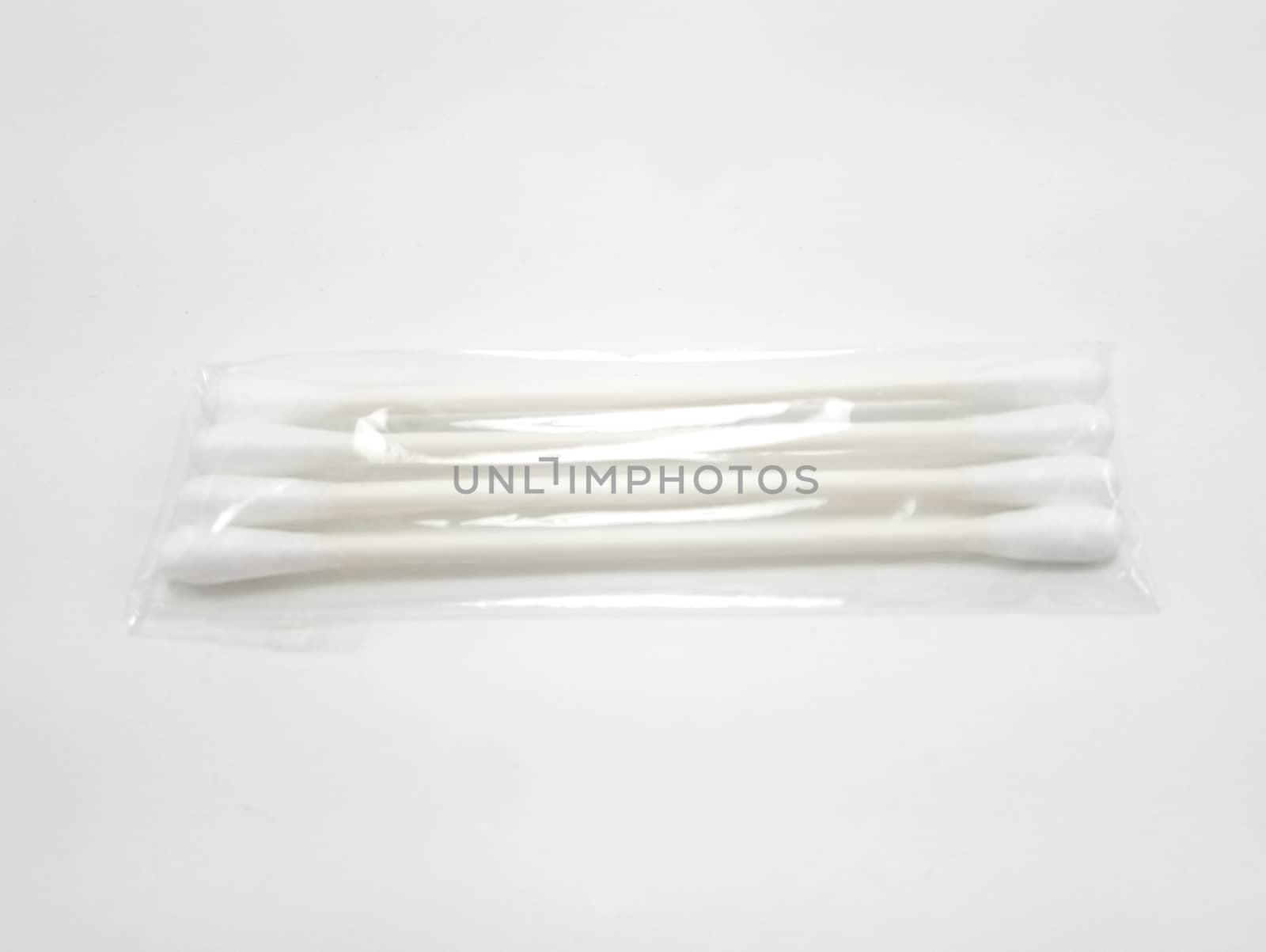Cotton buds at both ends of the plastic stick by imwaltersy